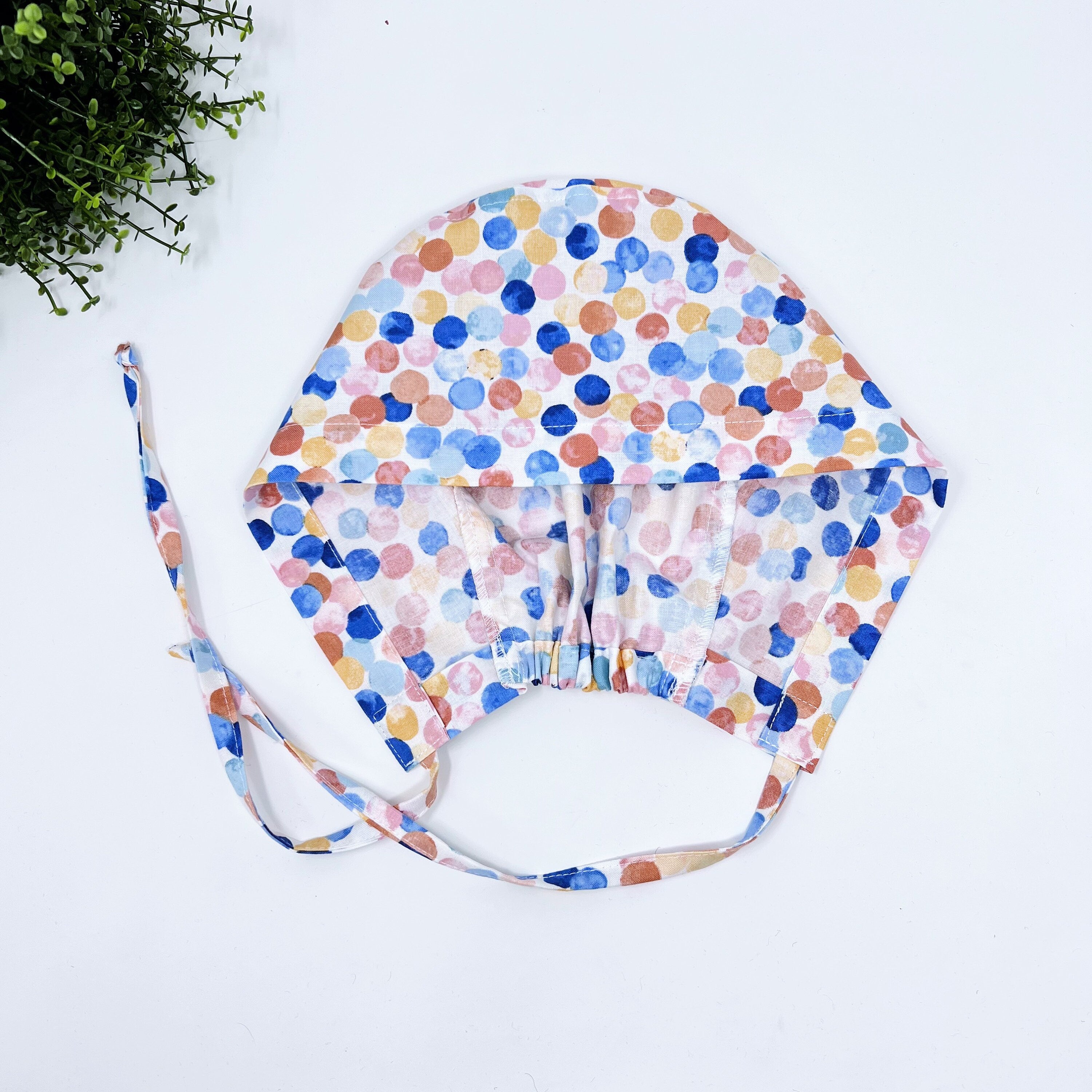 Dots Skull tie-back style surgical scrub cap for men by Paradise Caps.