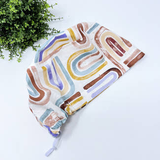 Rainbow Euro Scrub Cap for Women with Satin Lined Option by Paradise Caps.