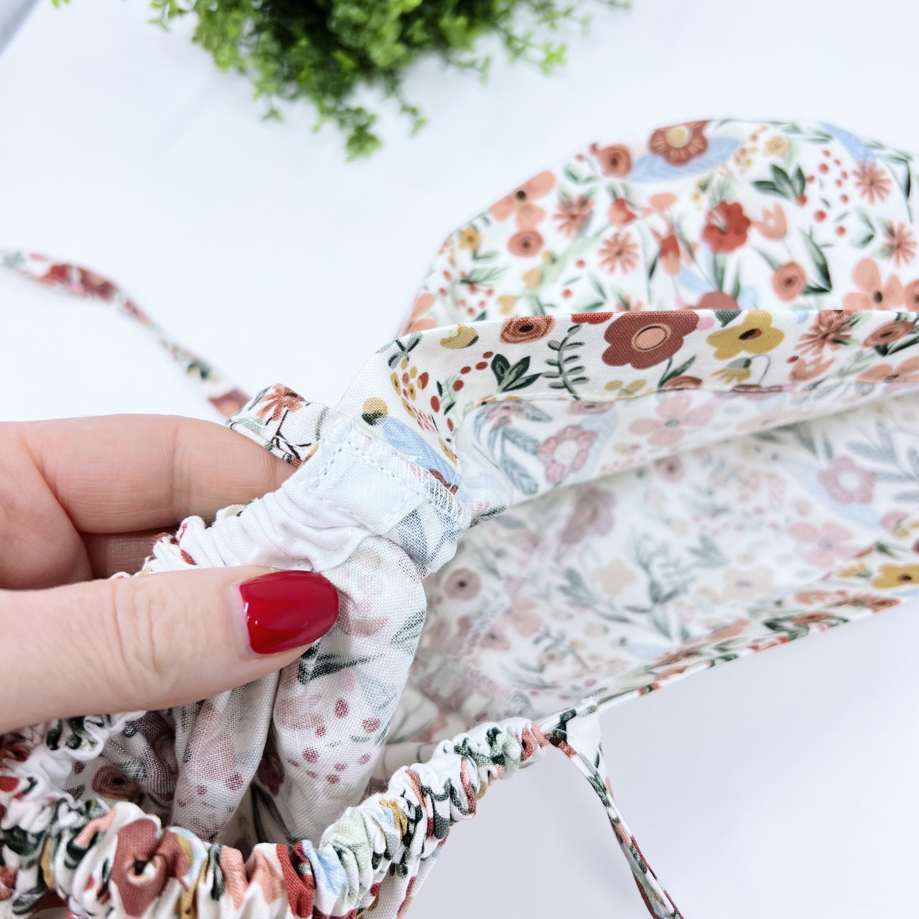 Floral Ponytail scrub cap for women with satin lined option by Paradise Caps.