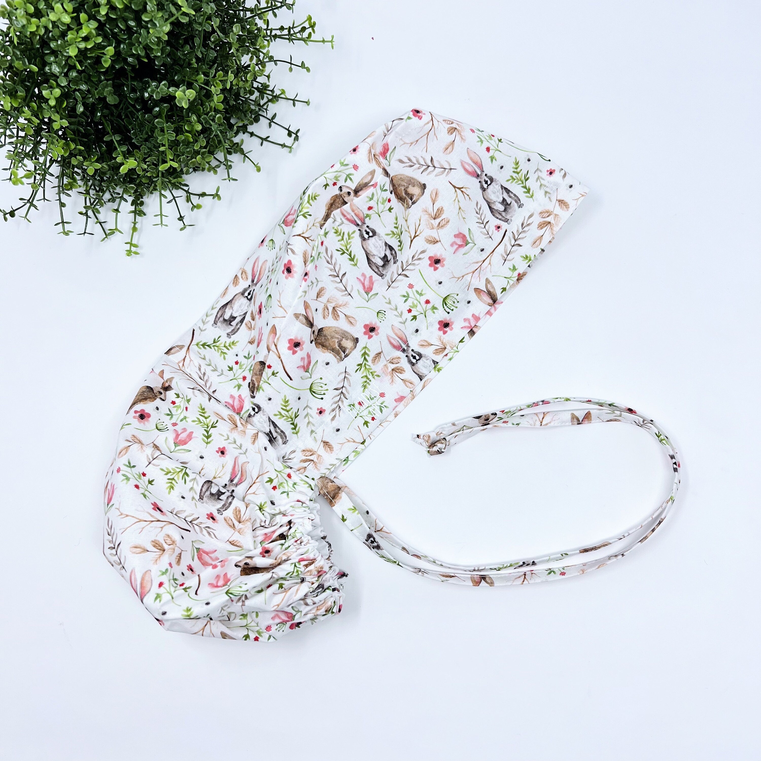 Easter Ponytail scrub cap for women with satin lined option by Paradise Caps.