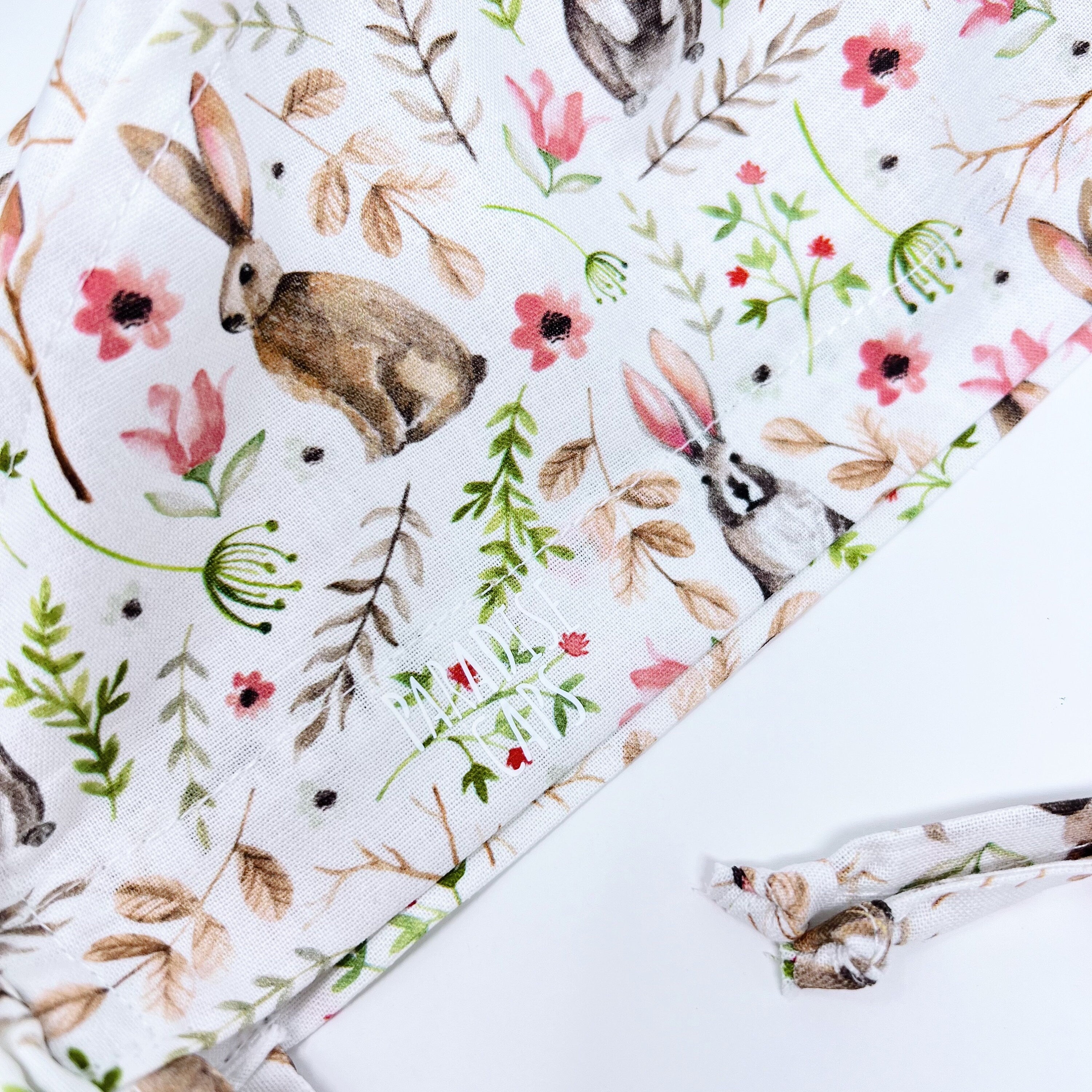 Easter Ponytail scrub cap for women with satin lined option by Paradise Caps.