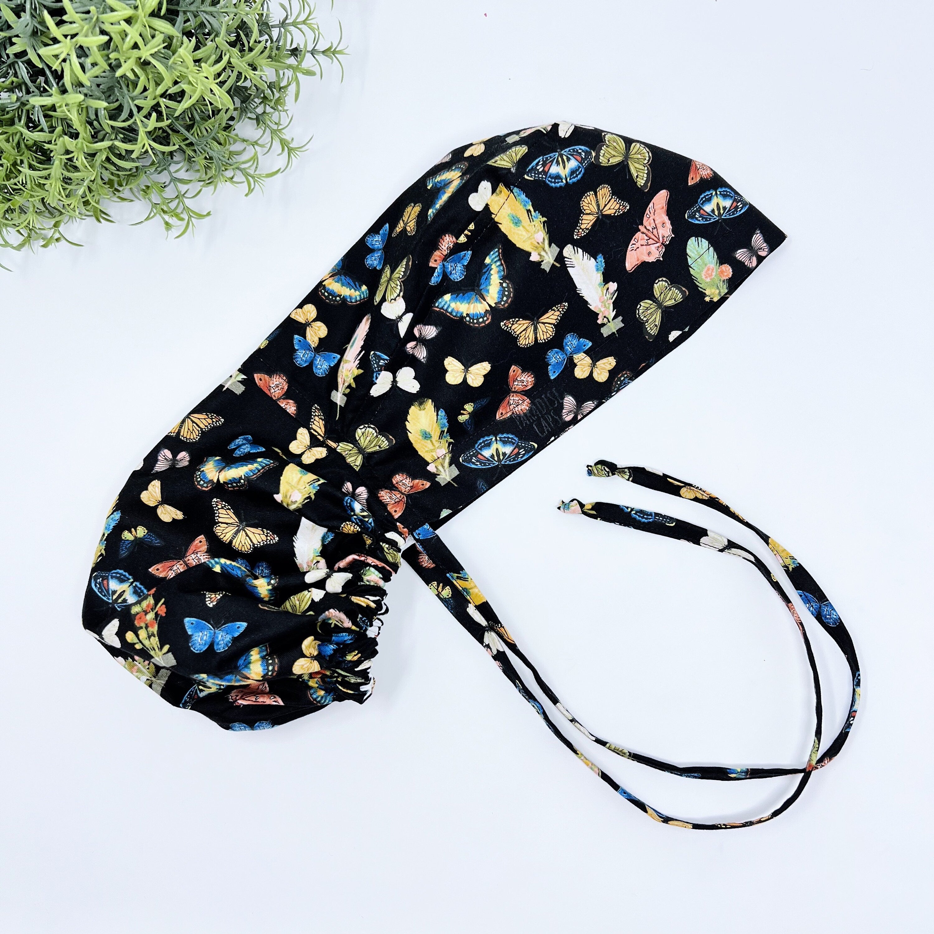 Butterflies Ponytail scrub cap for women with satin lined option by Paradise Caps.