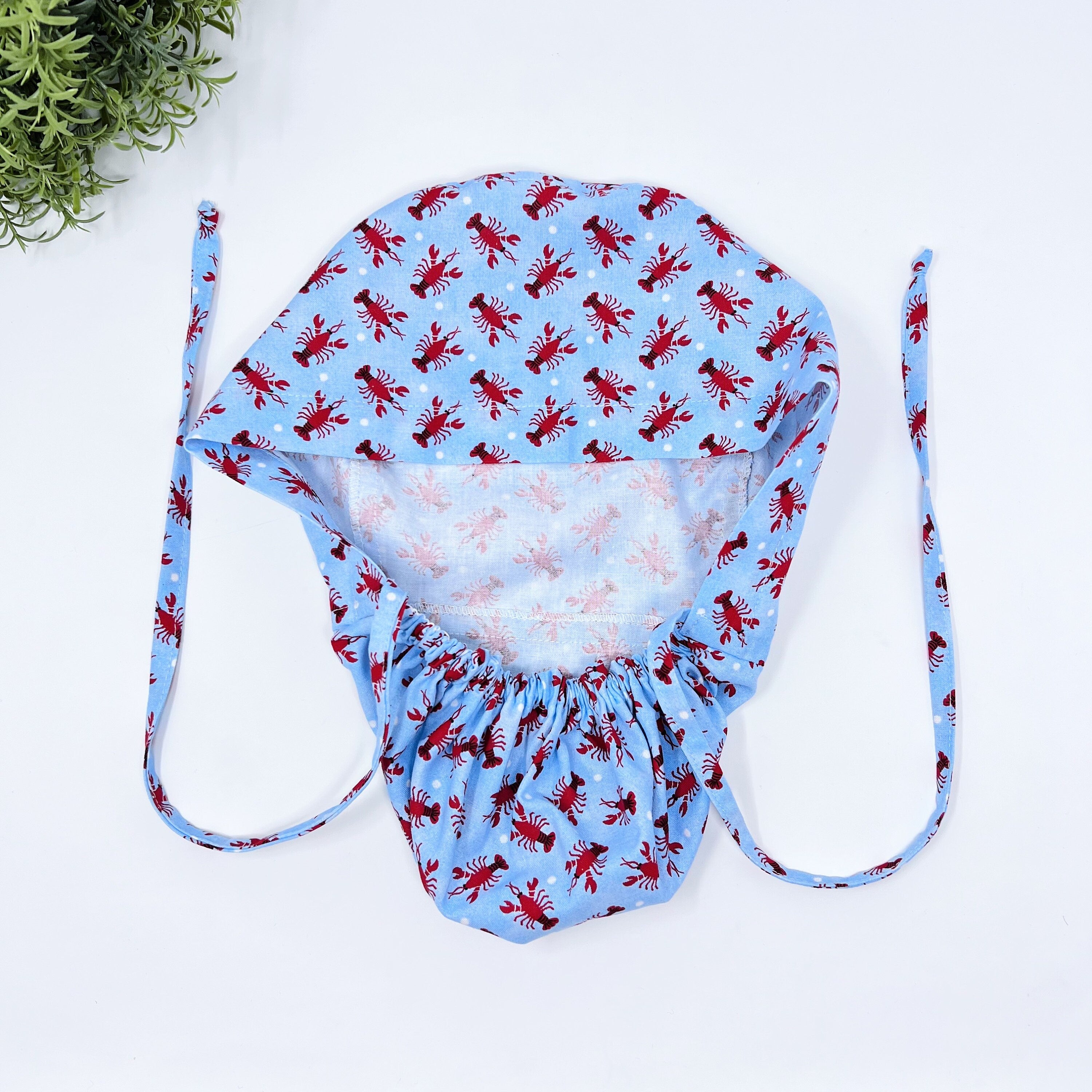 Lobster Ponytail scrub cap for women with satin lined option by Paradise Caps.