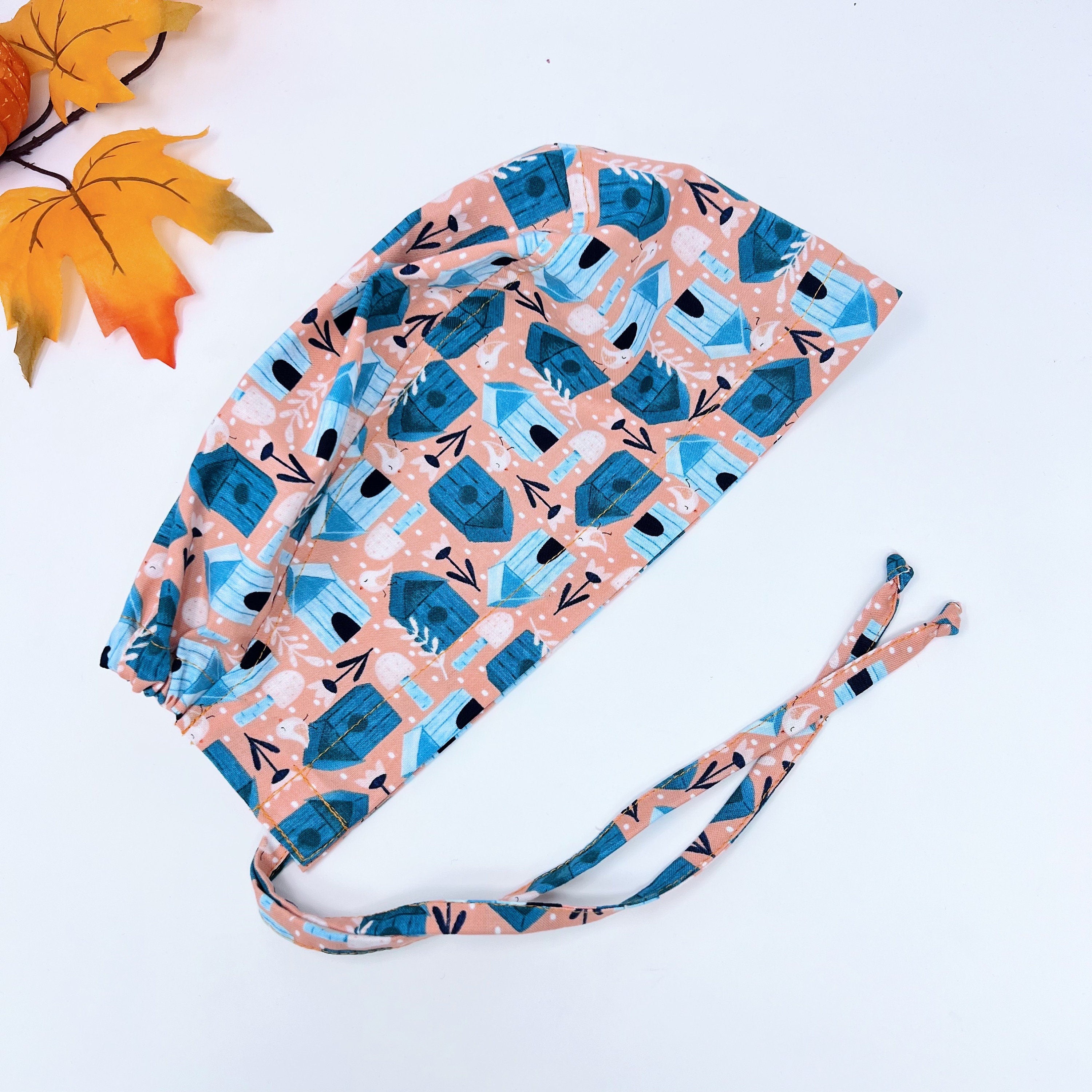 Birdhouses Skull tie-back style surgical scrub cap for men by Paradise Caps.