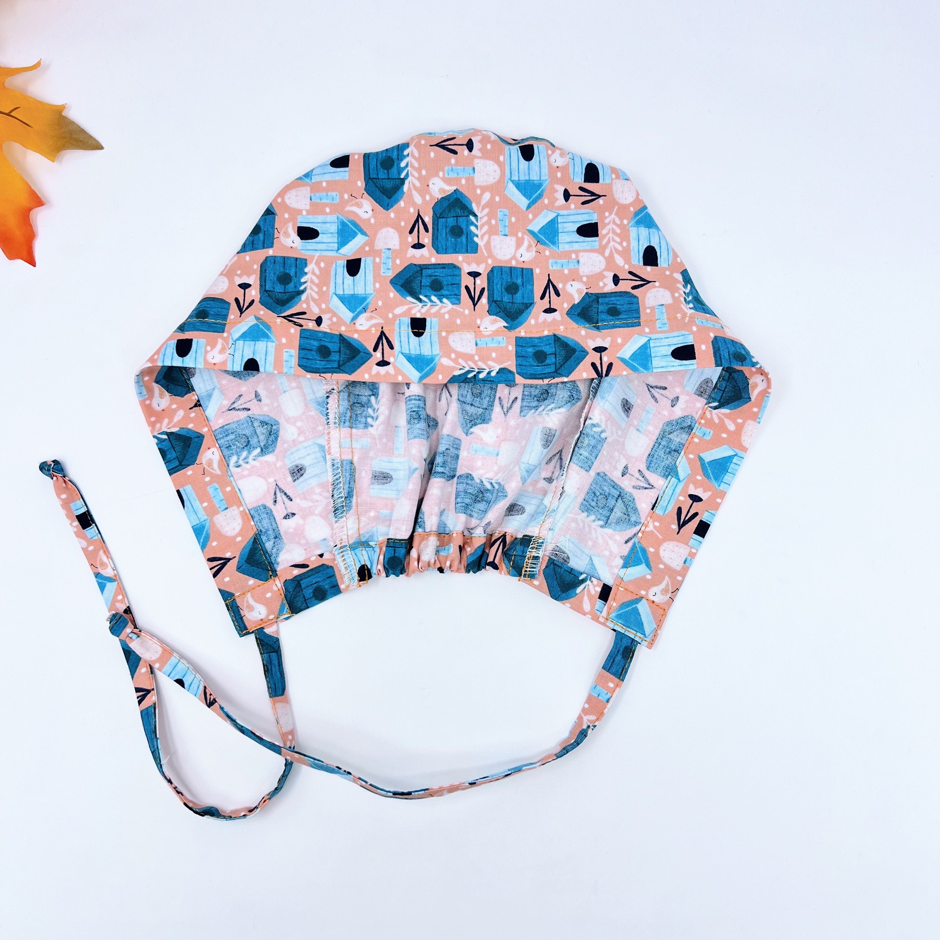 Birdhouses Skull tie-back style surgical scrub cap for men by Paradise Caps.