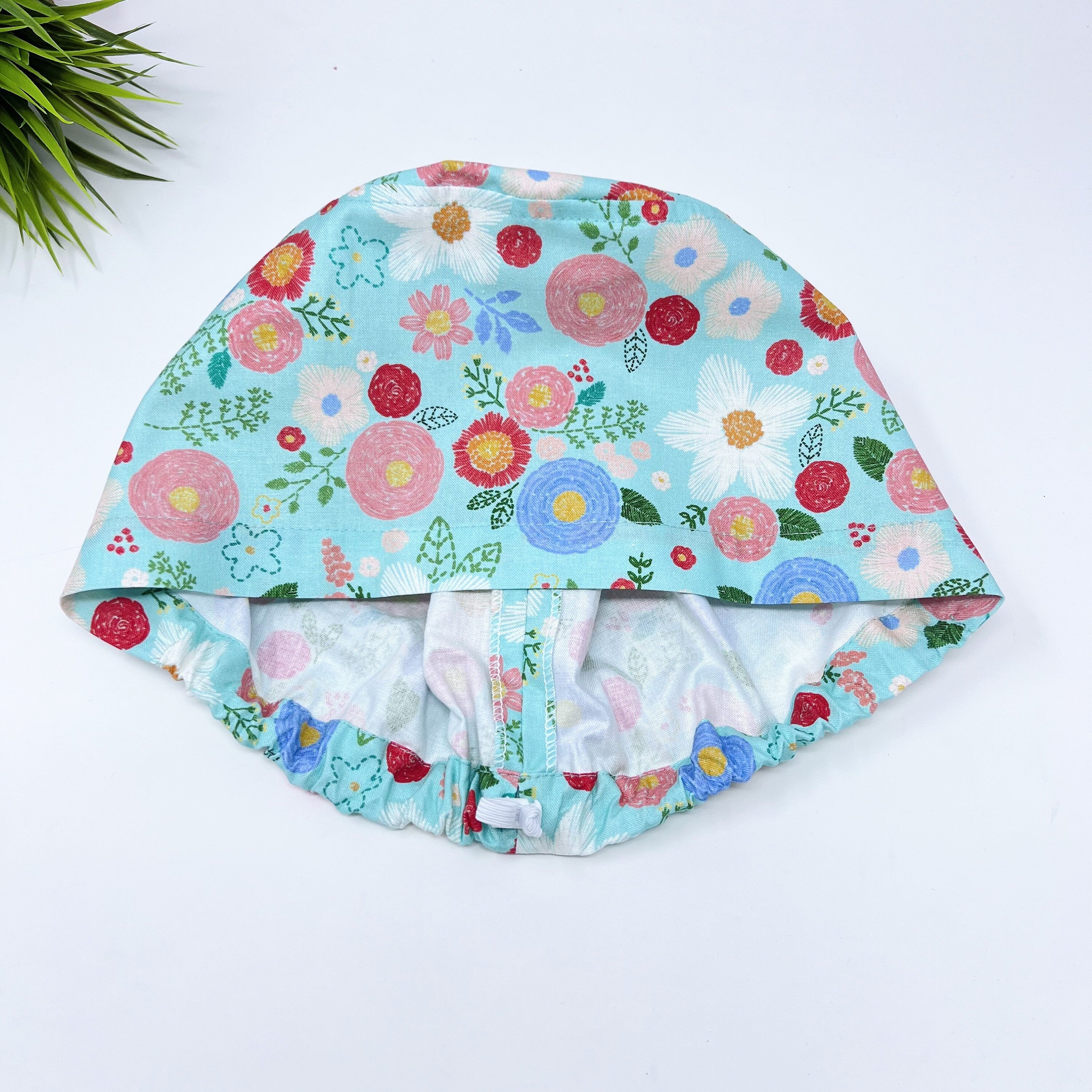 Green floral Euro Scrub Cap for Women with Satin Lined Option by Paradise Caps.