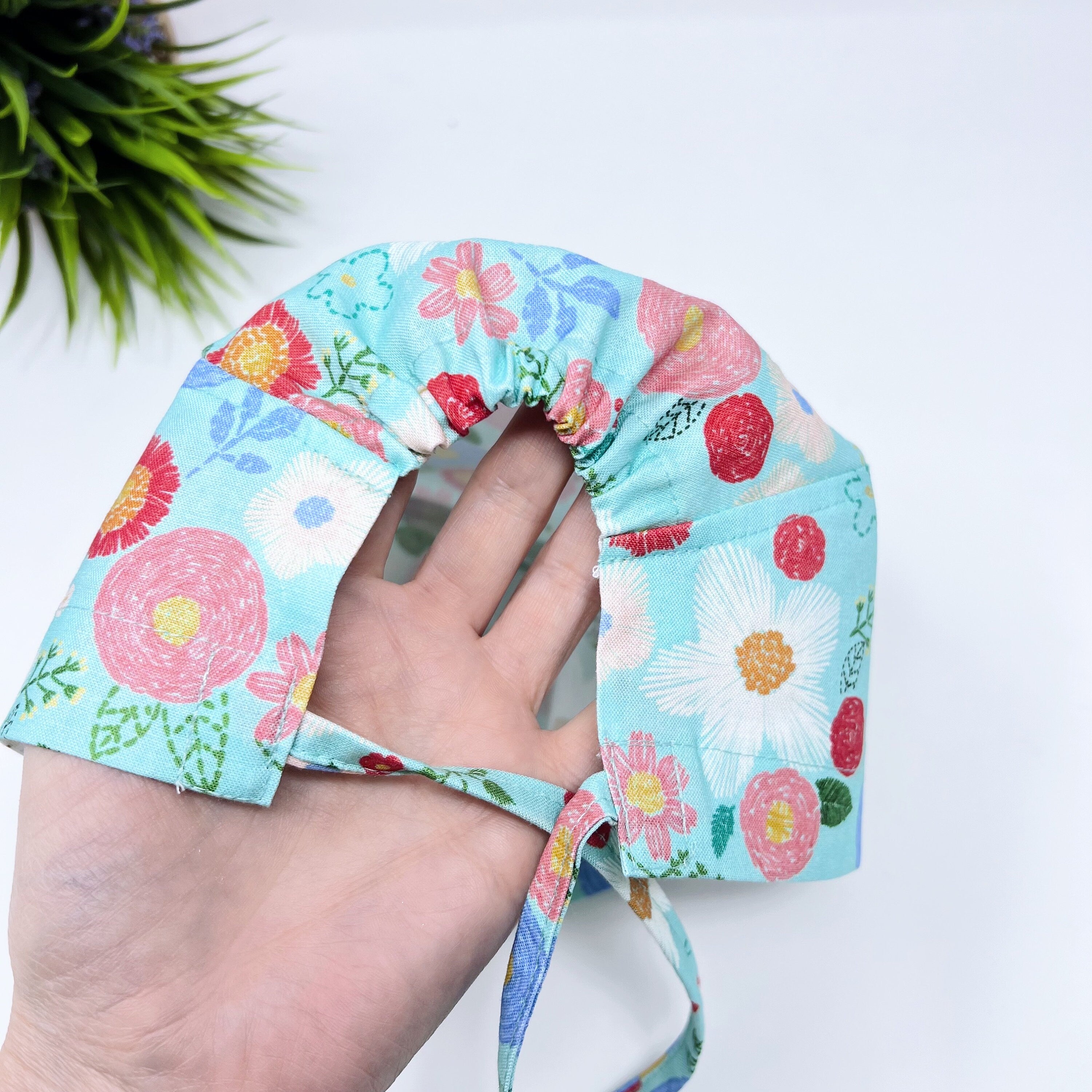 Green floral Skull tie-back style surgical scrub cap for men by Paradise Caps.