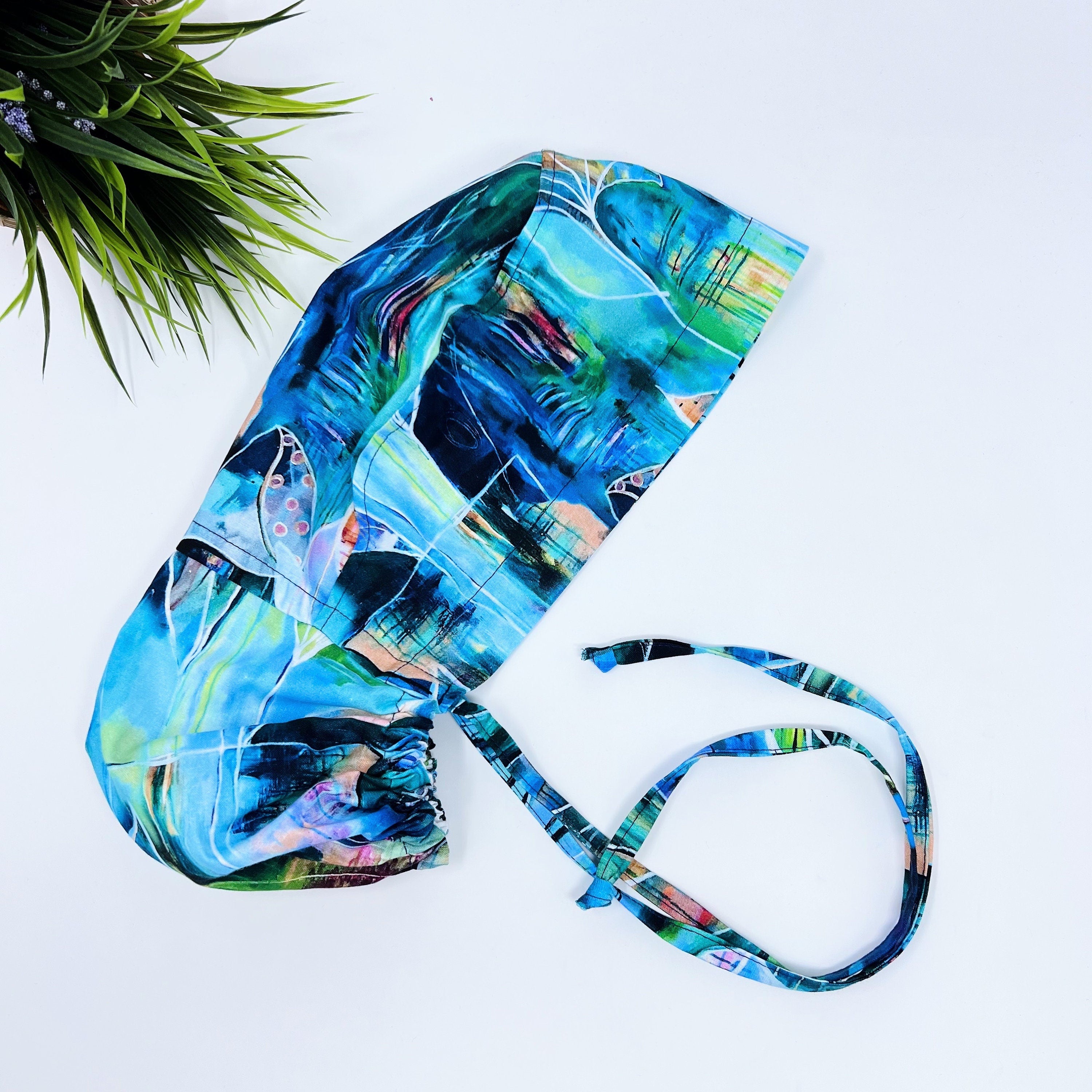 Large Floral Leaves Ponytail scrub cap for women with satin lined option by Paradise Caps.