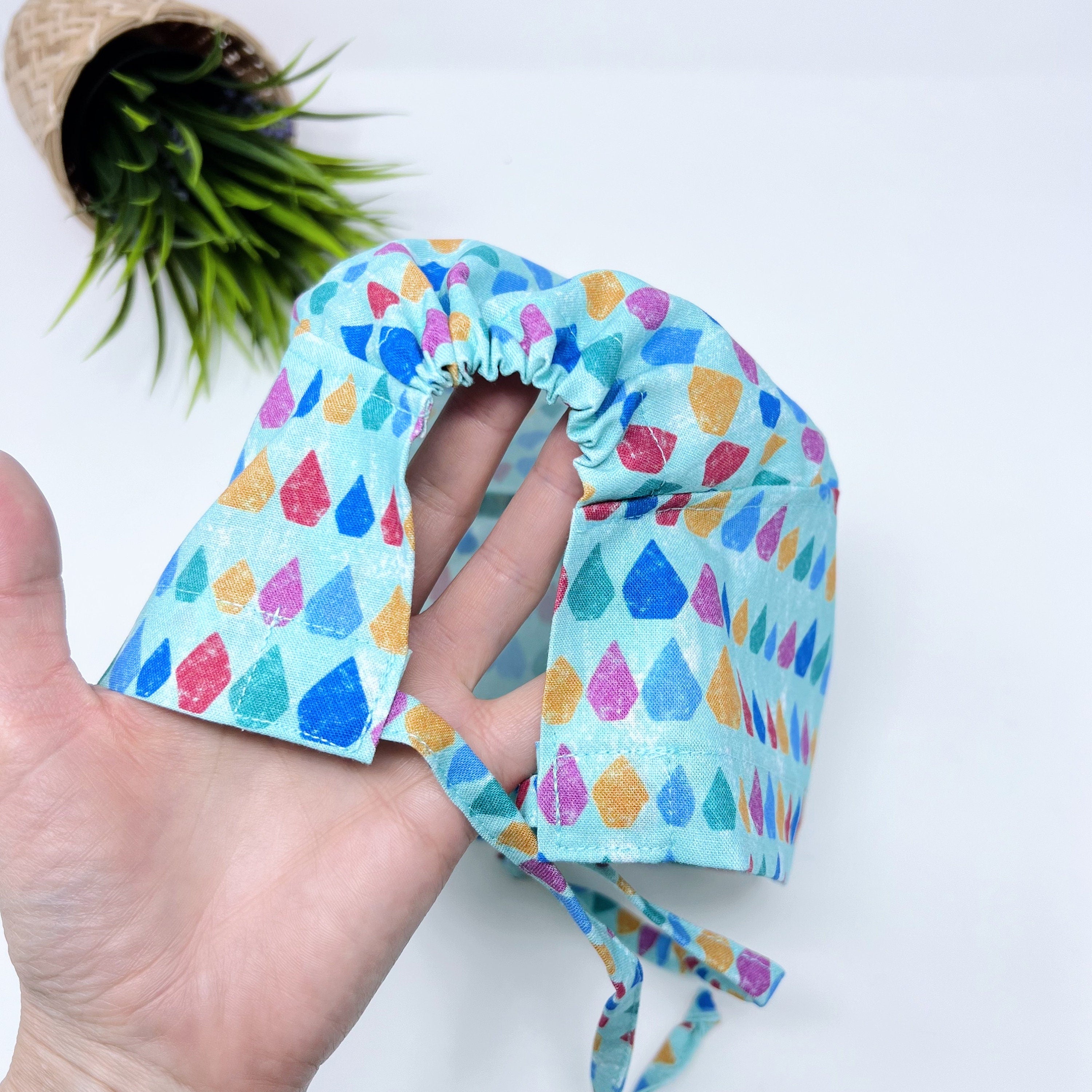 Aqua Scales Skull tie-back style surgical scrub cap for men by Paradise Caps.