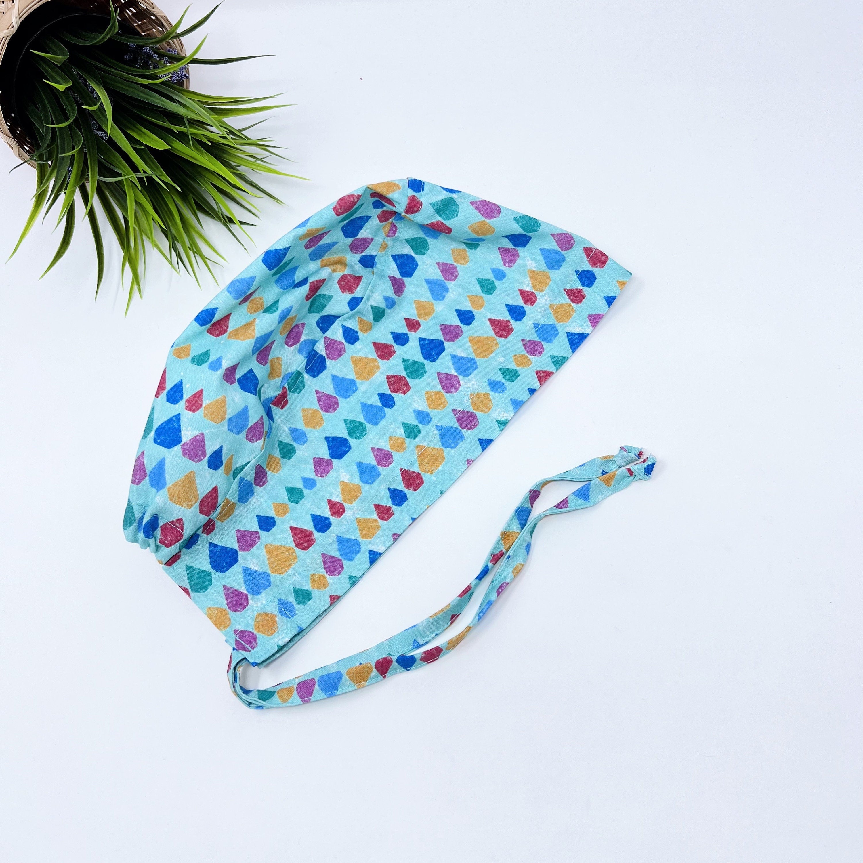 Aqua Scales Skull tie-back style surgical scrub cap for men by Paradise Caps.