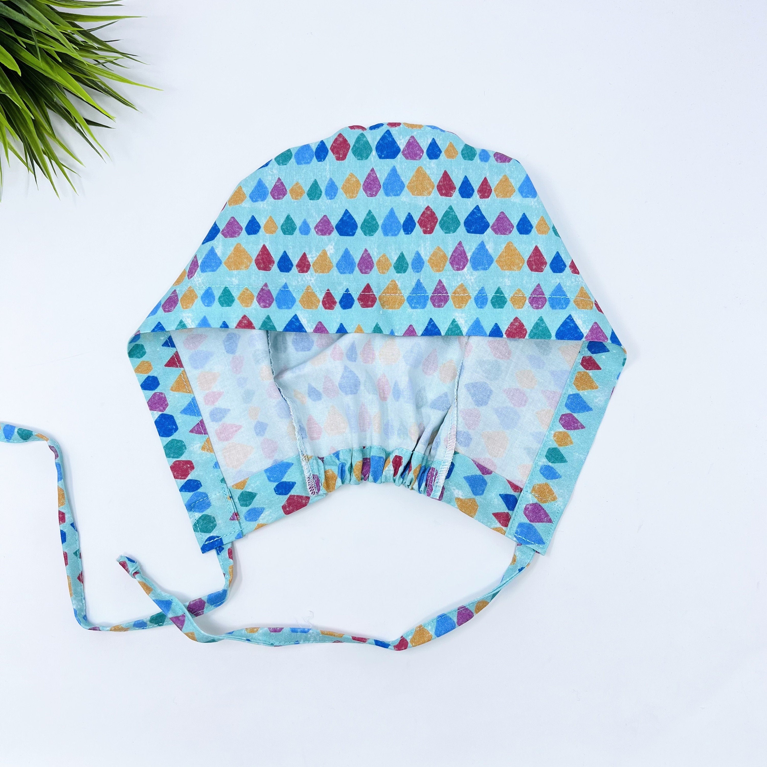 Aqua Scales Skull tie-back style surgical scrub cap for men by Paradise Caps.