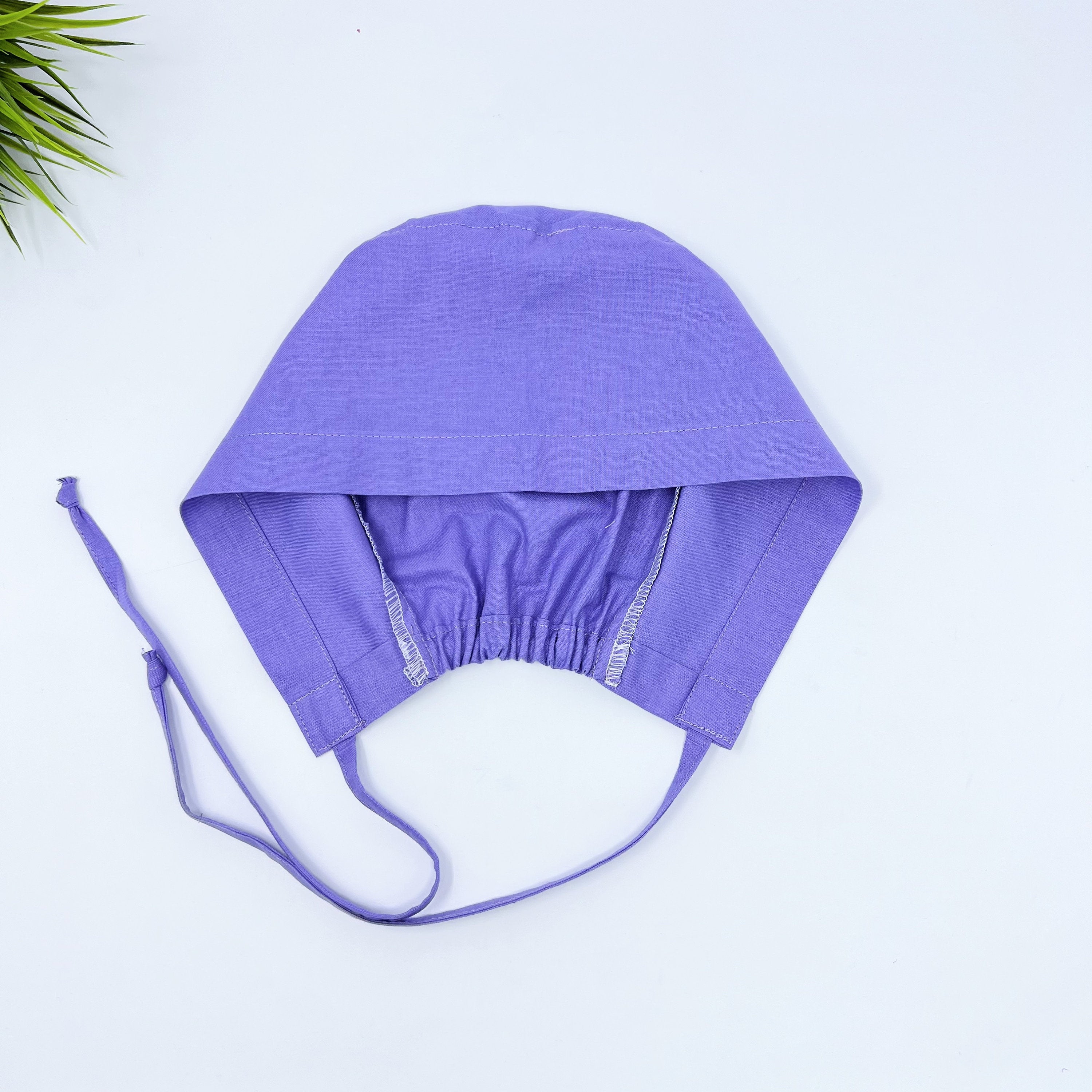 Light purple Skull tie-back style surgical scrub cap for men by Paradise Caps.
