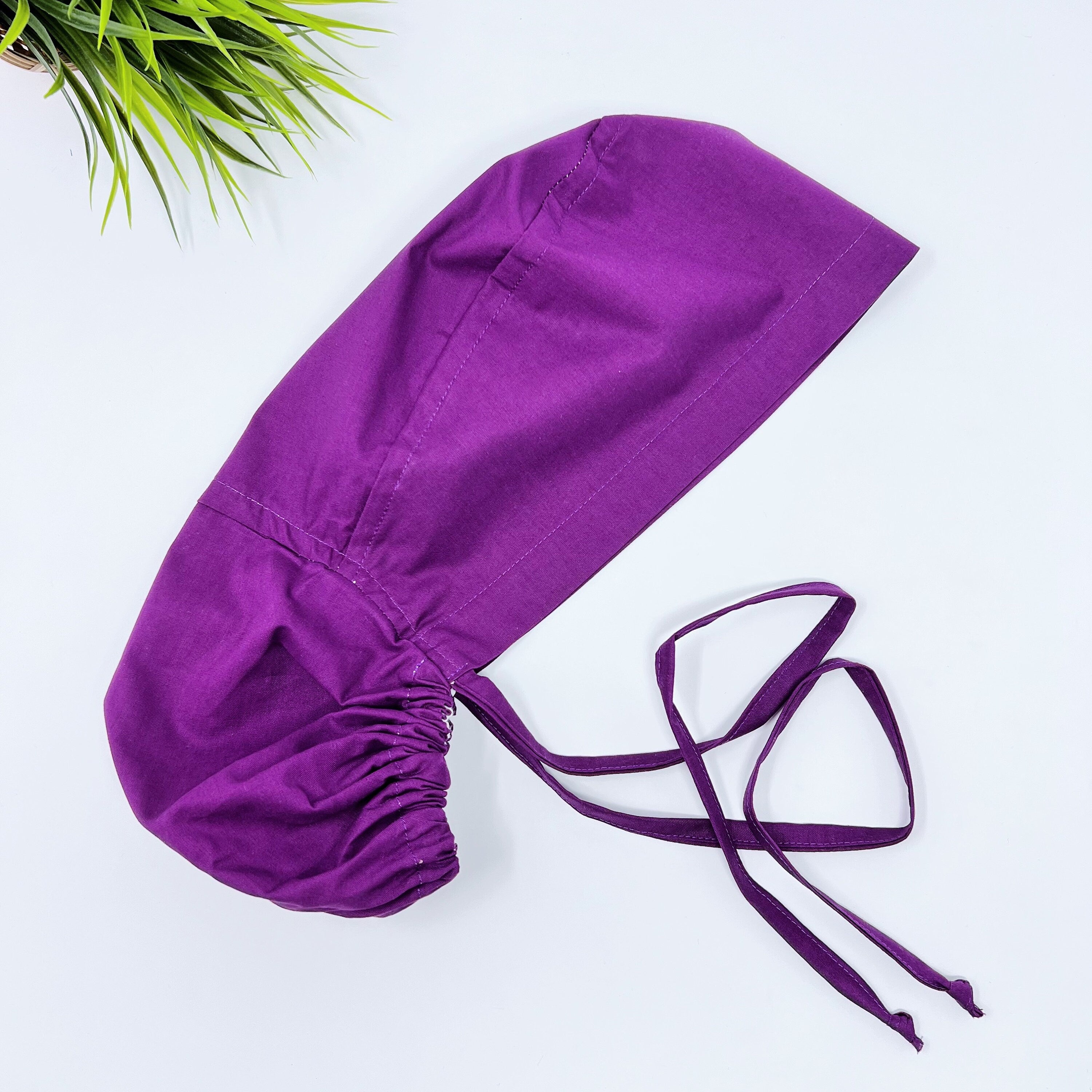 Violet solid Ponytail scrub cap for women with satin lined option by Paradise Caps.