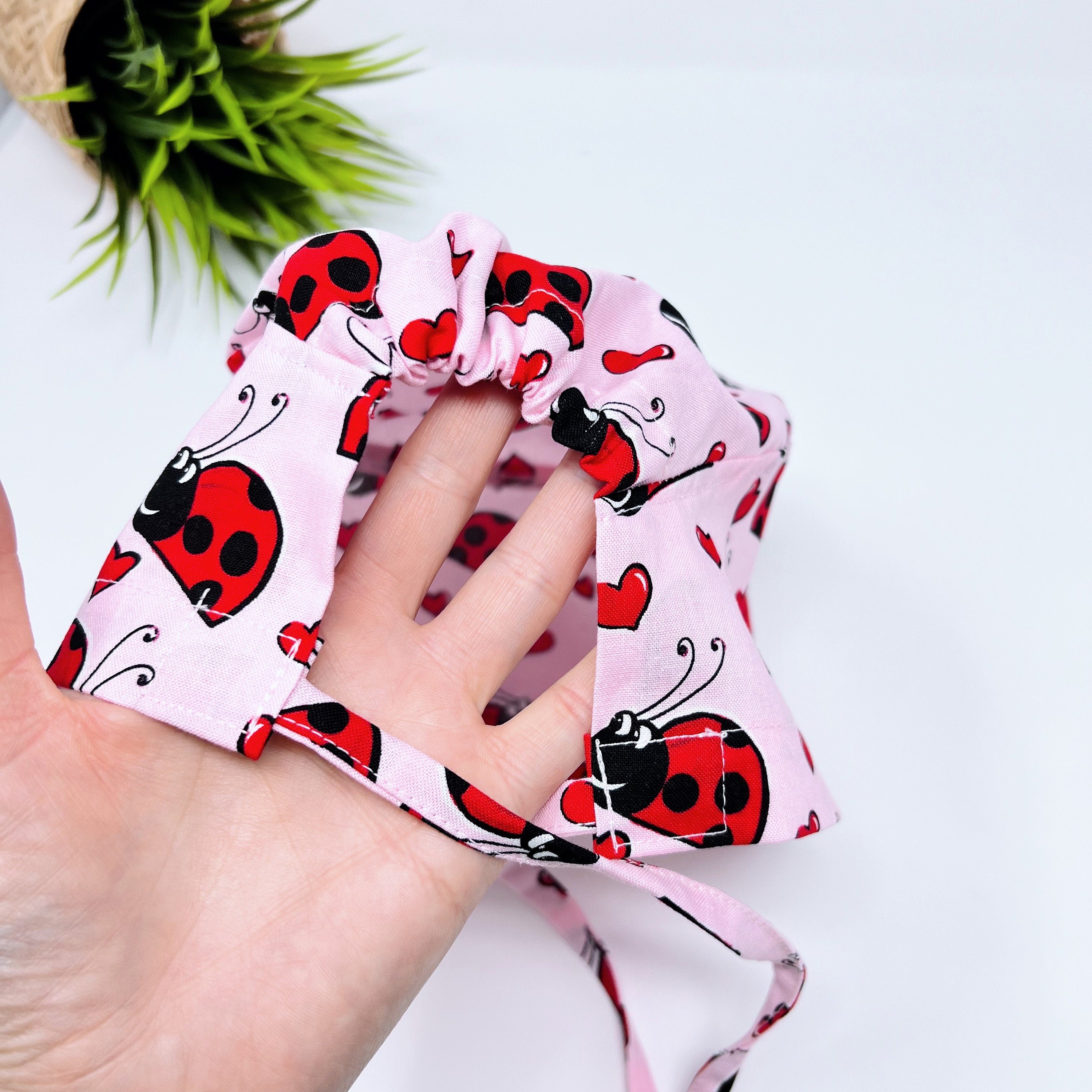 Ladybug Skull tie-back style surgical scrub cap by Paradise Caps.
