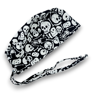 Glow Tossed Skull tie-back style surgical scrub cap for men by Paradise Caps. Glows in the Dark!