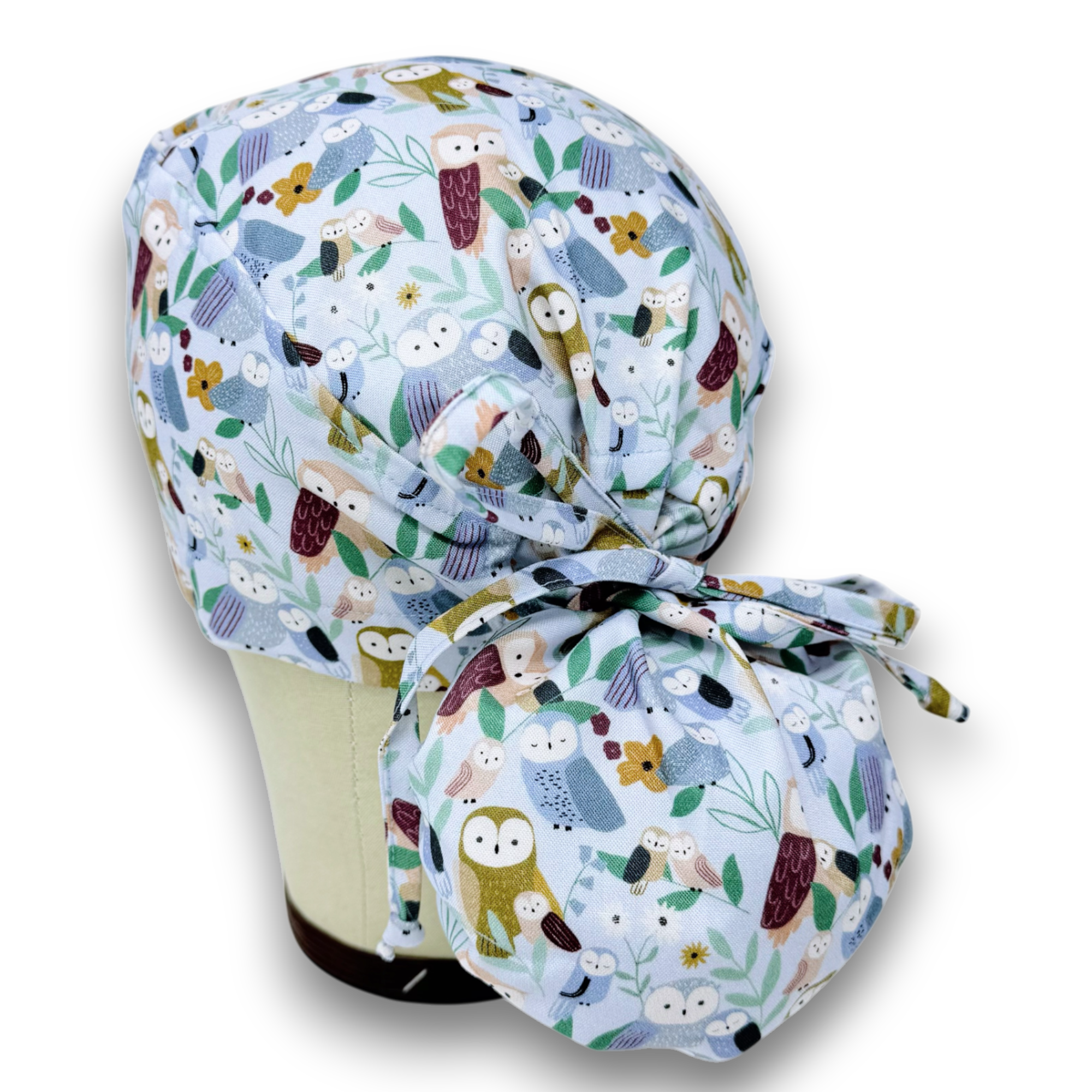 Owl Ponytail scrub cap for women with satin lined option by Paradise Caps.