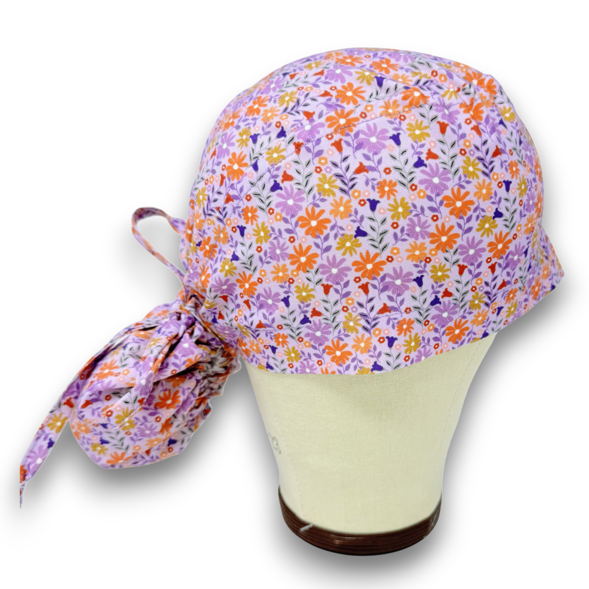 Purple Daisy Ponytail scrub cap for women. Flower Scrub hat for women with satin lined option by Paradise Caps.