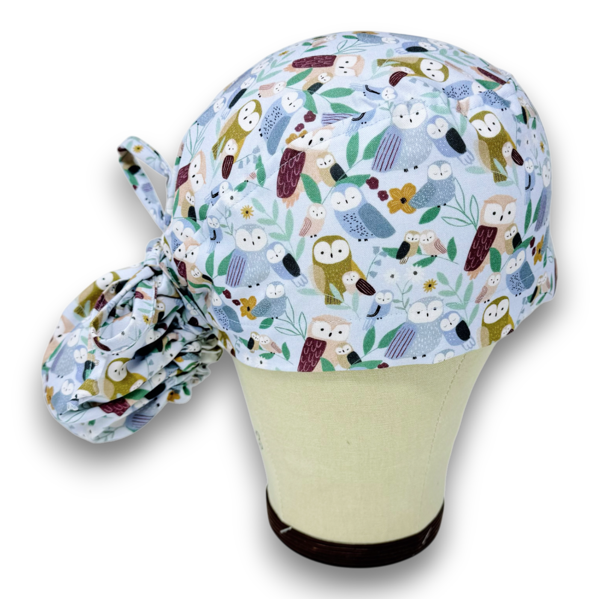 Owl Ponytail scrub cap for women with satin lined option by Paradise Caps.
