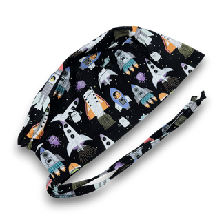 Men's surgical scrub cap. Black Space Rocket Print skull tie-back style scrub hat by Paradise Caps.