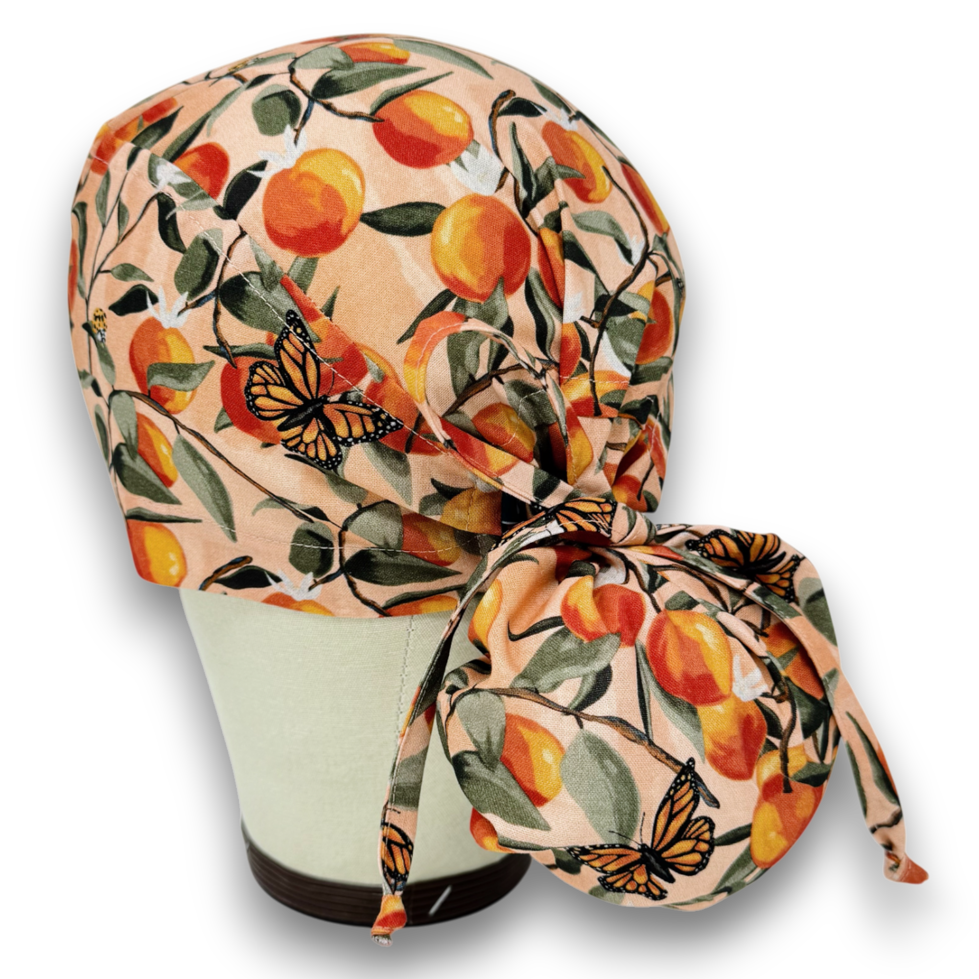 Peach Ponytail scrub cap for women with satin lined option by Paradise Caps.