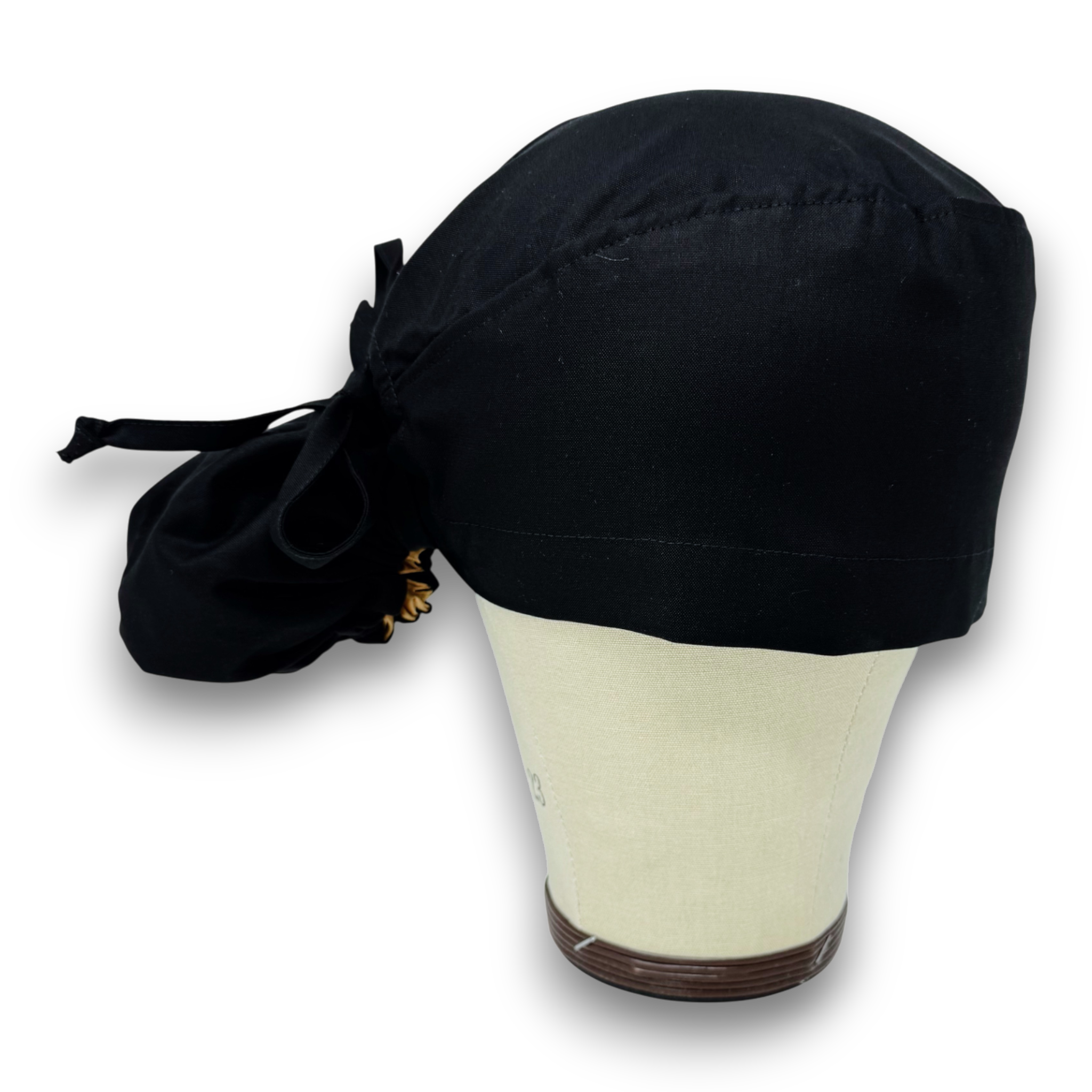 Black Ponytail scrub cap for women with satin lined option by Paradise Caps.