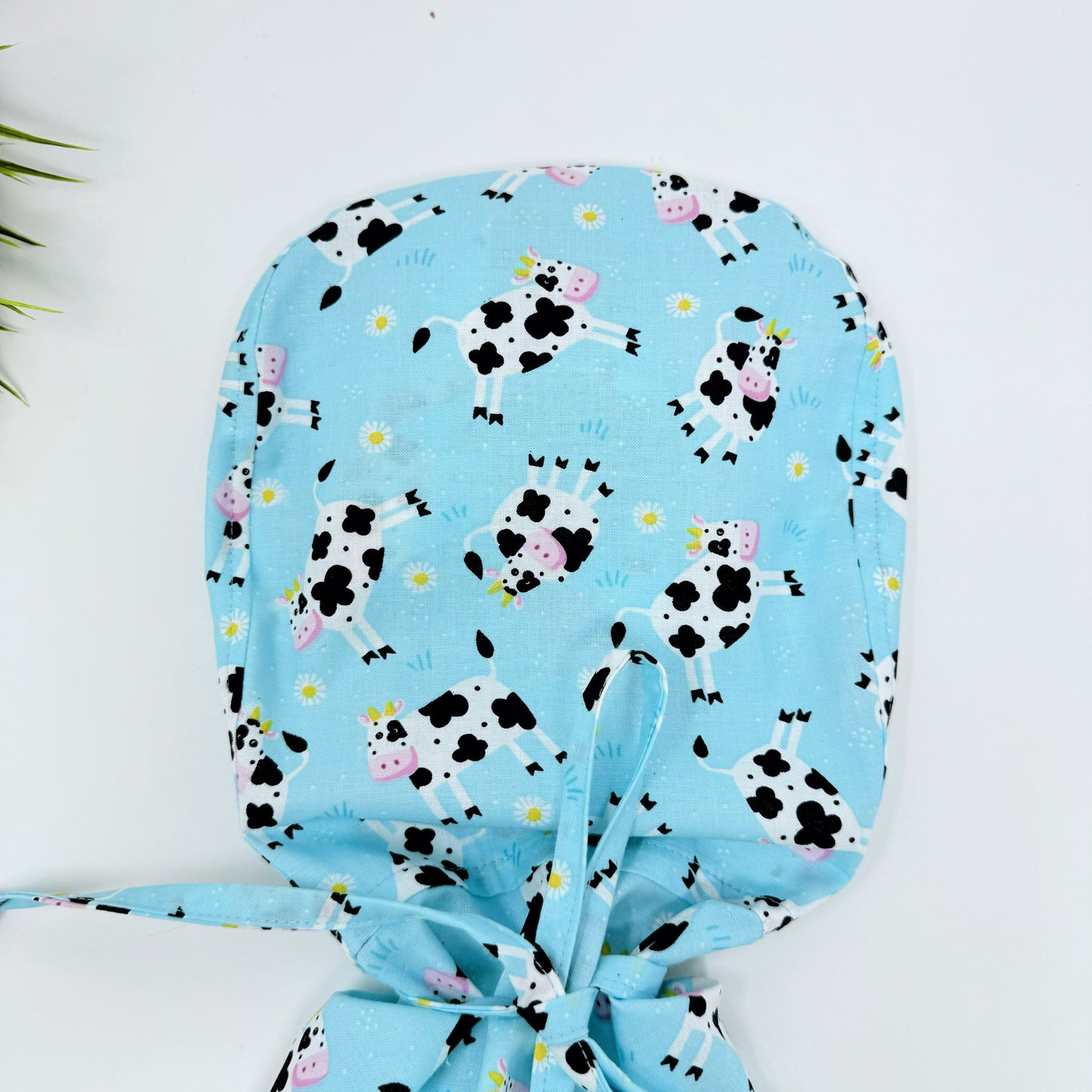 Cows on Blue Ponytail scrub cap, Surgical cap women. Satin Lined Option Surgical cap with ponytail.