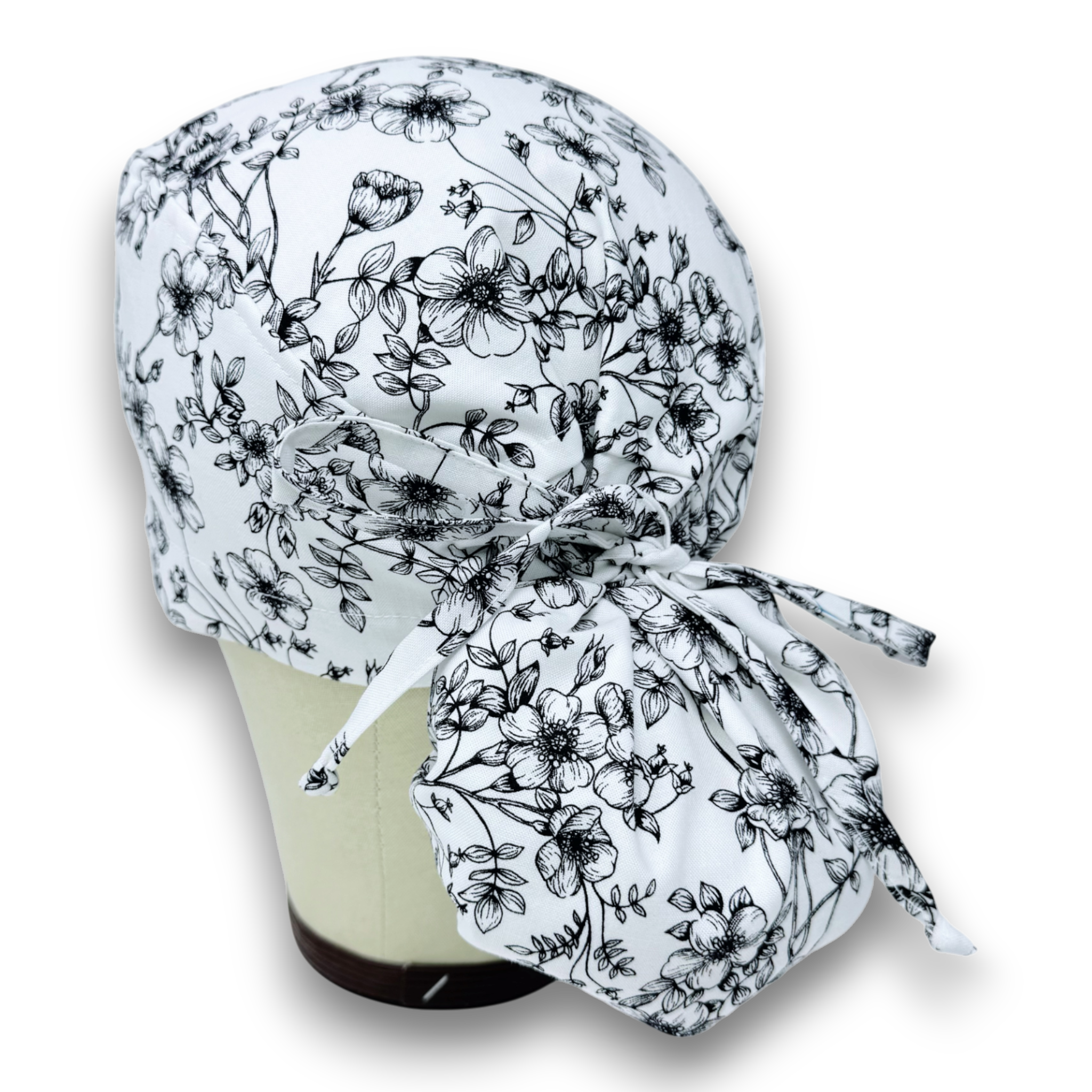 Floral Ponytail scrub cap for women with satin lined option by Paradise Caps.