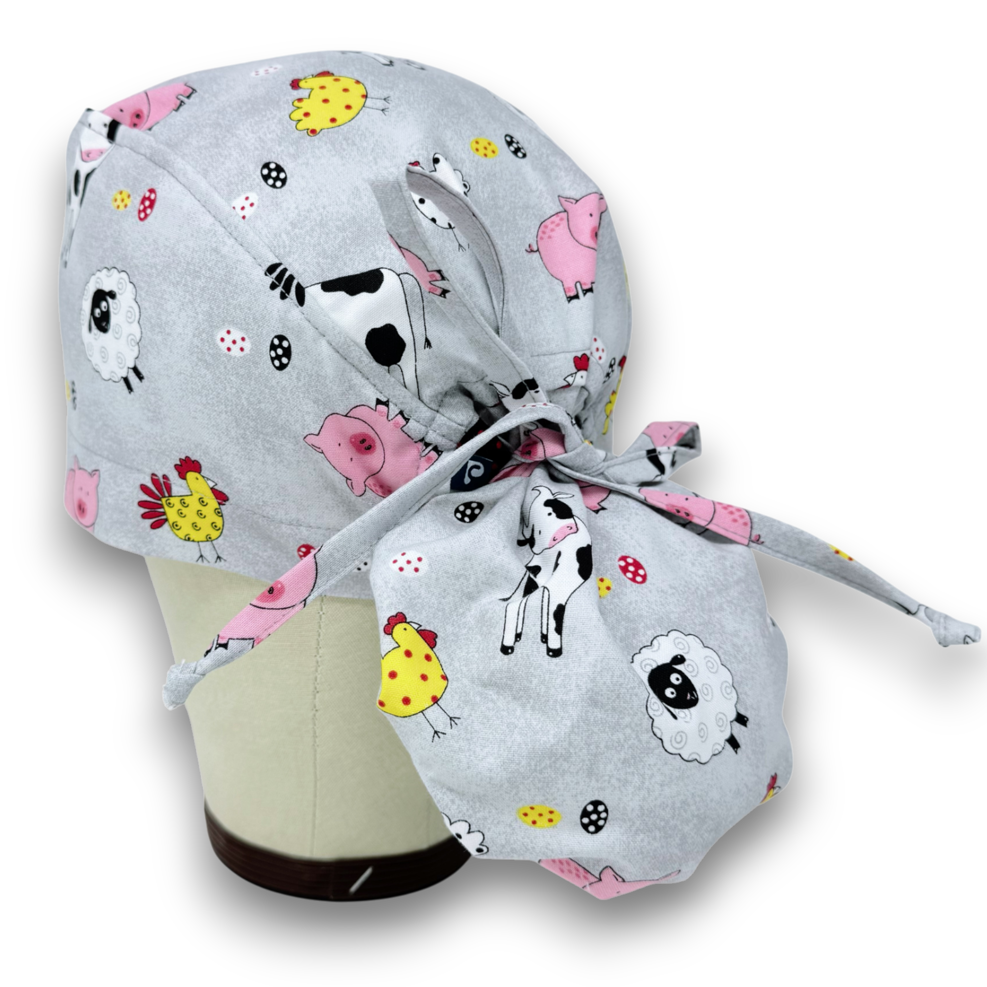 Farm Ponytail scrub cap for women. Cow Satin Lined Option Surgical cap with ponytail by Paradise Caps.