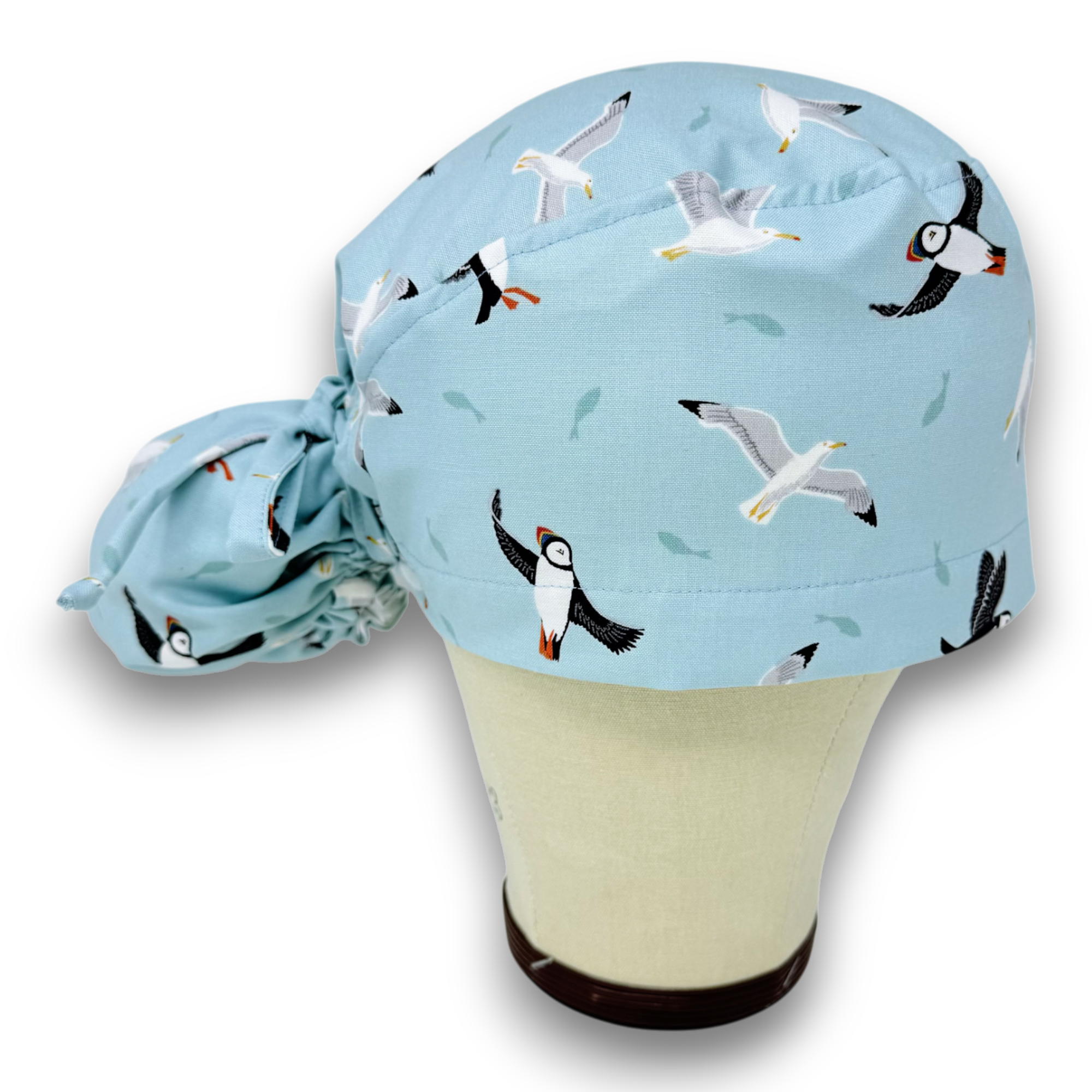 Puffin Ponytail scrub cap for women with satin lined option by Paradise Caps.