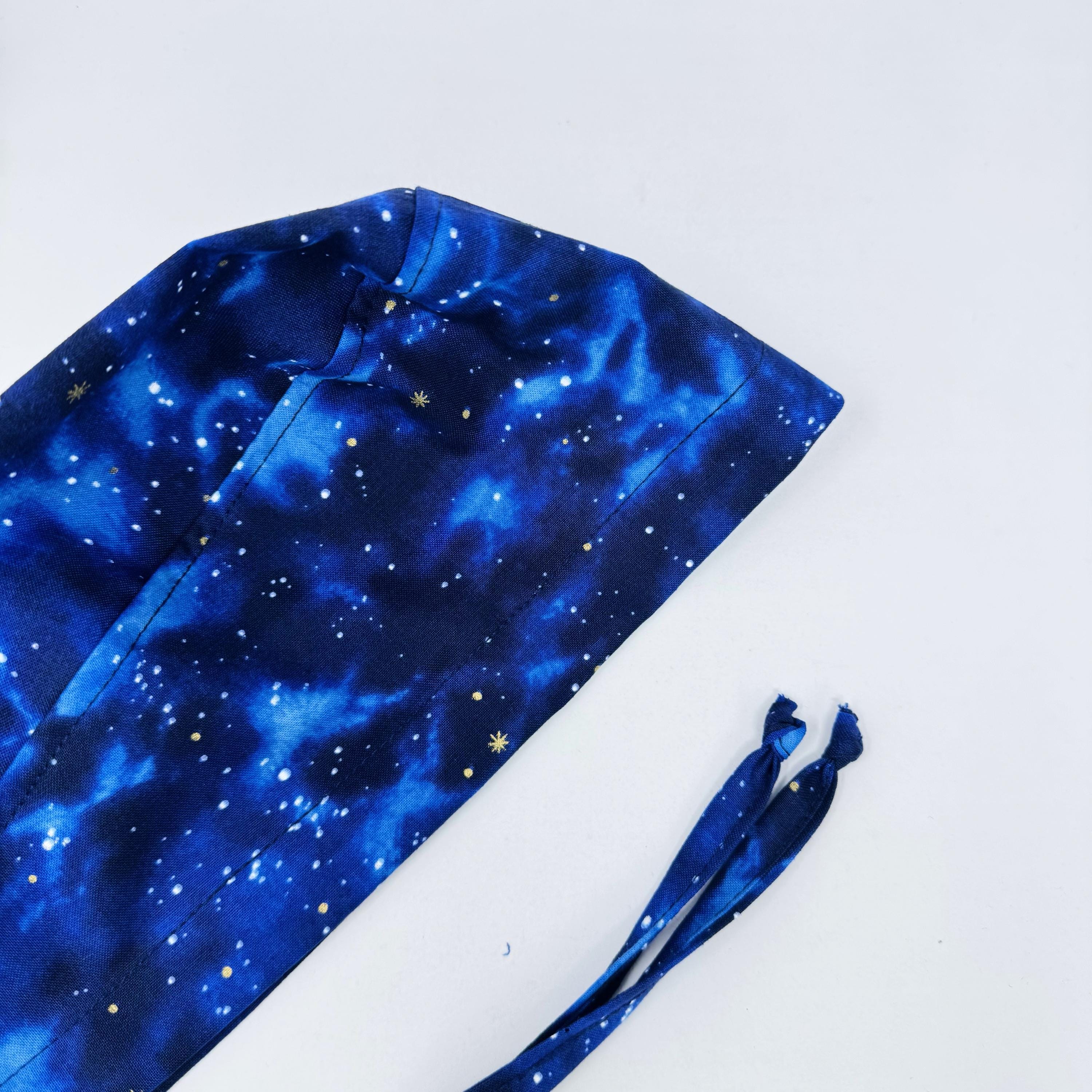 Night sky Men's Skull tie-back style surgical scrub cap for men by Paradise Caps.