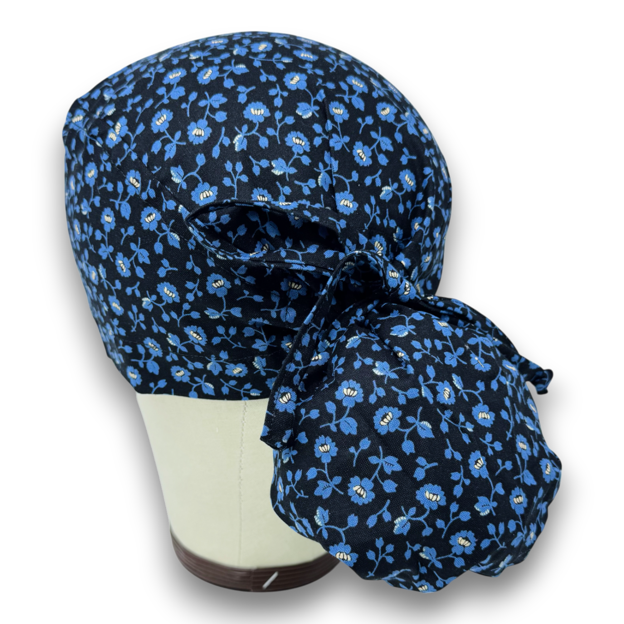 Blue Flower Ponytail scrub cap for women with satin lined option by Paradise Caps.
