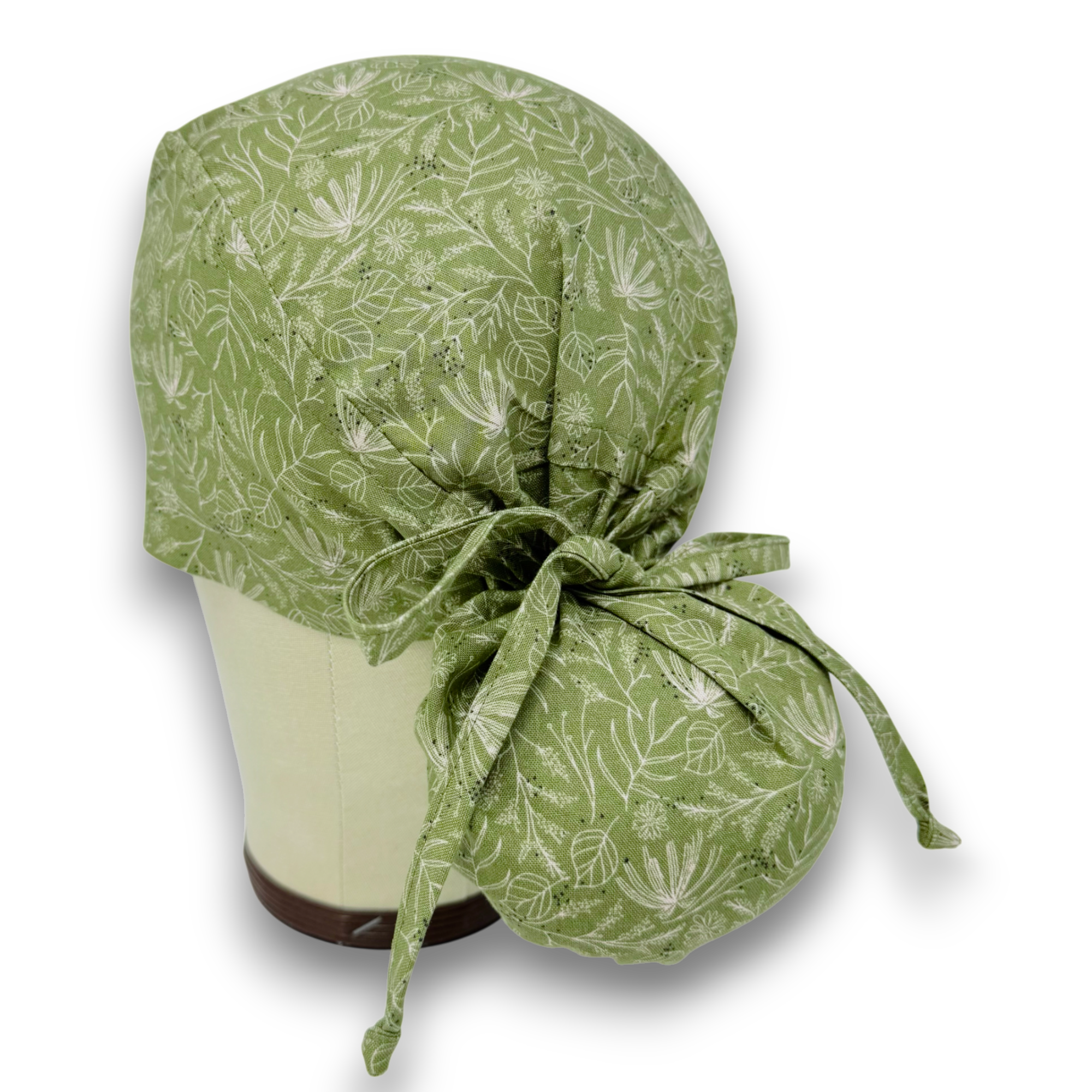 Green Floral Ponytail scrub cap for women with satin lined option by Paradise Caps.