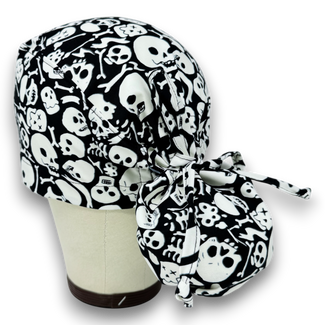 Glow Tossed Skulls Ponytail scrub cap for women with satin lined option by Paradise Caps. Glows in the Dark!