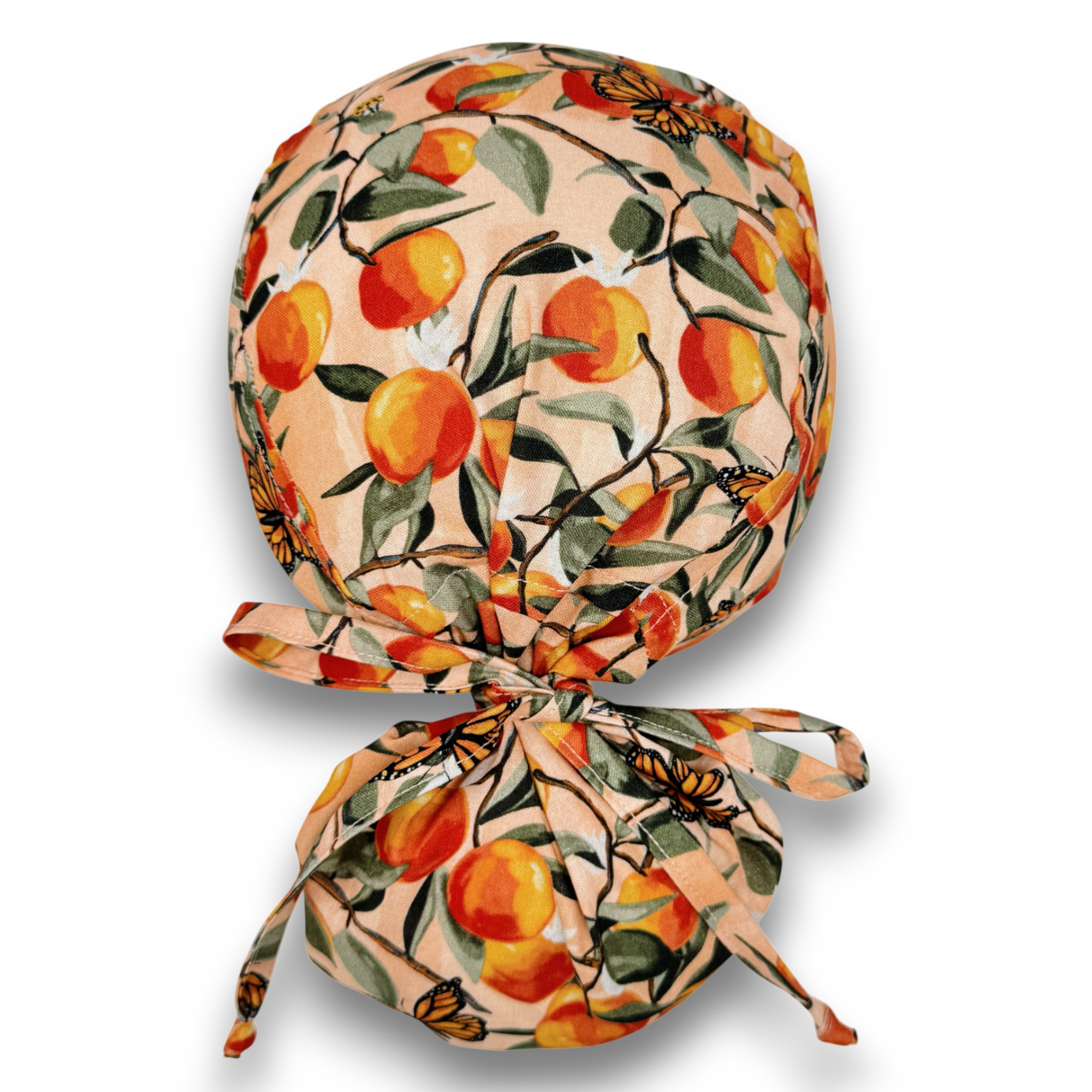 Peach Ponytail scrub cap for women with satin lined option by Paradise Caps.