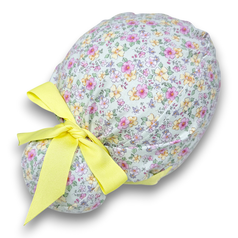 Pastel floral Euro Plus scrub cap with yellow ribbon ties