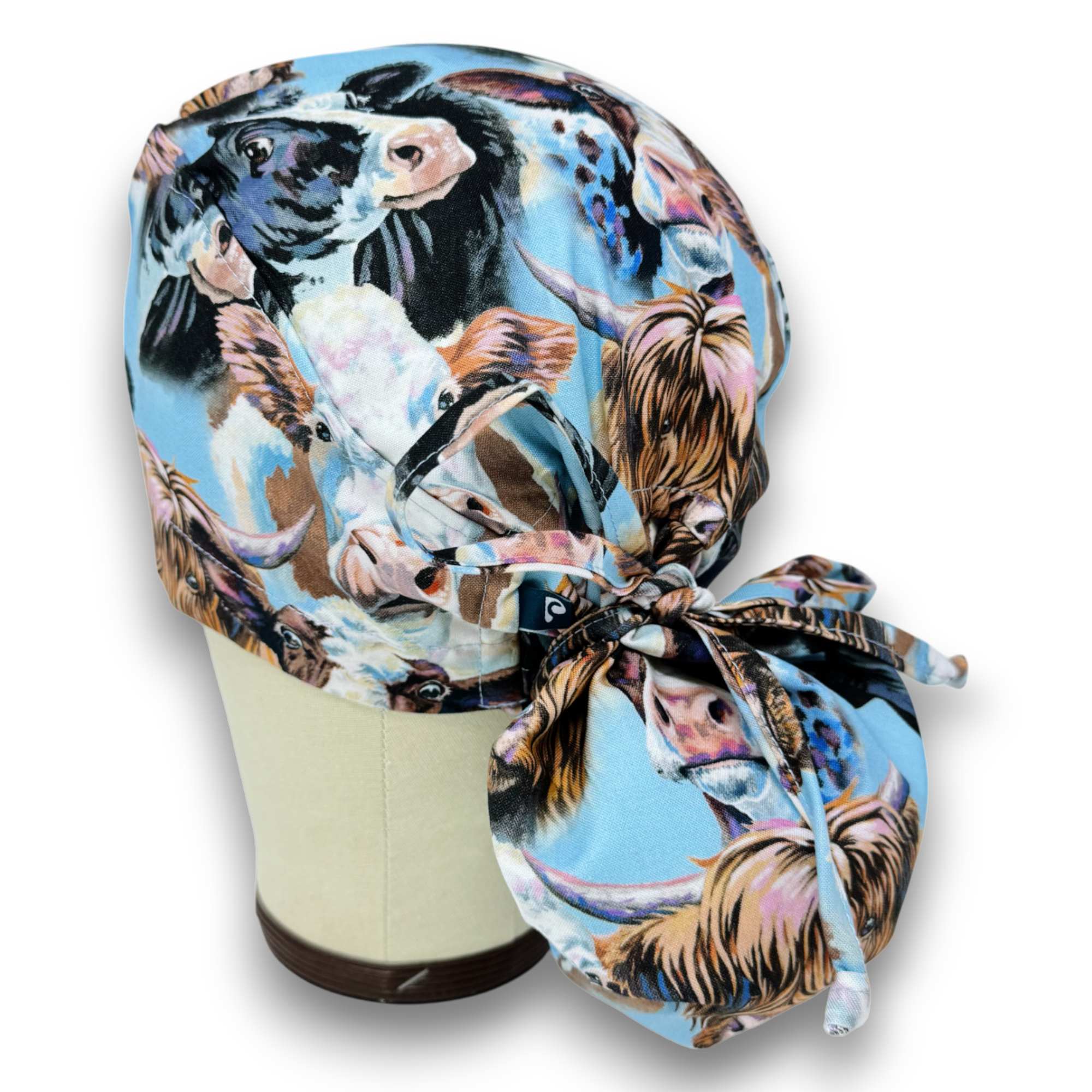 Cows Ponytail scrub cap for women with satin lined option by Paradise Caps.