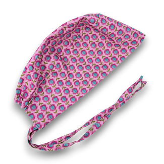 Floral Skull tie-back style surgical scrub cap with satin lined by Paradise Caps. Pink.