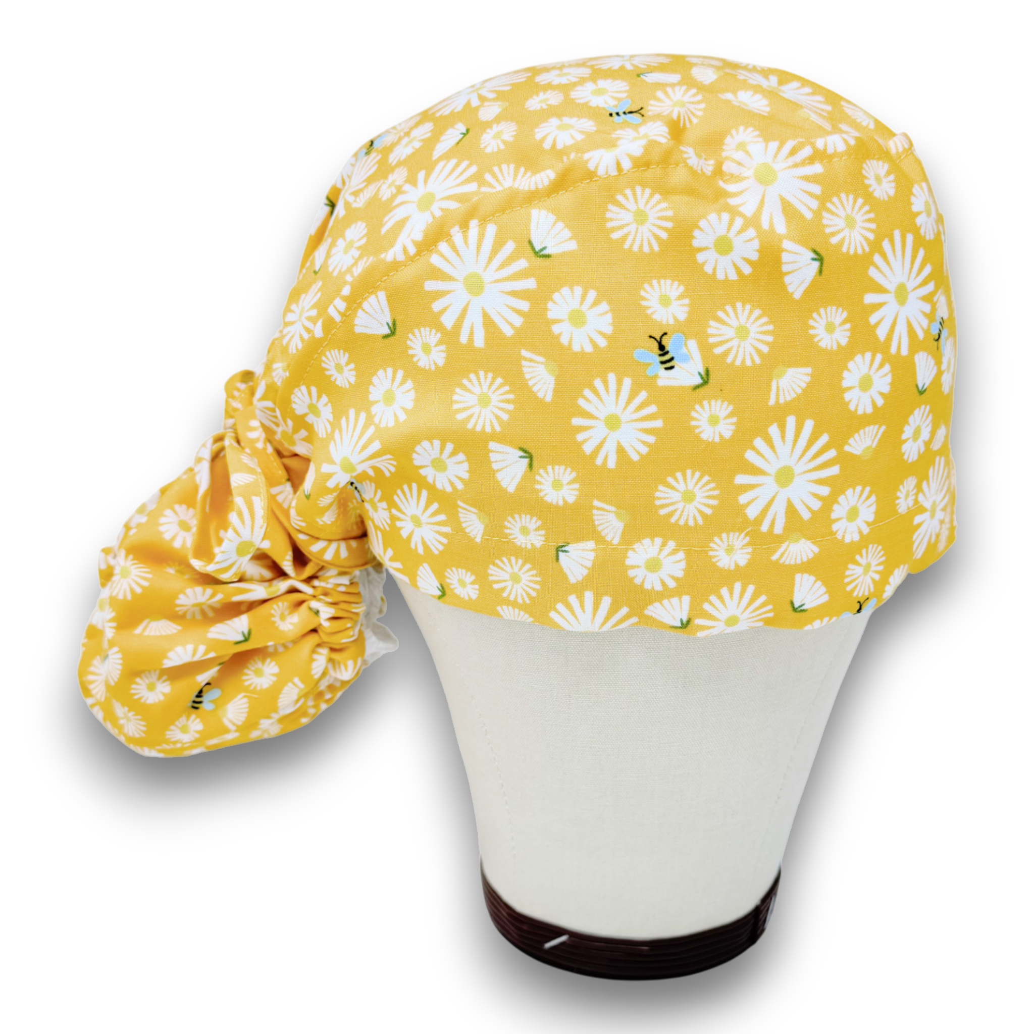 Yellow flowers Ponytail scrub cap for women with satin lined option by Paradise Caps.