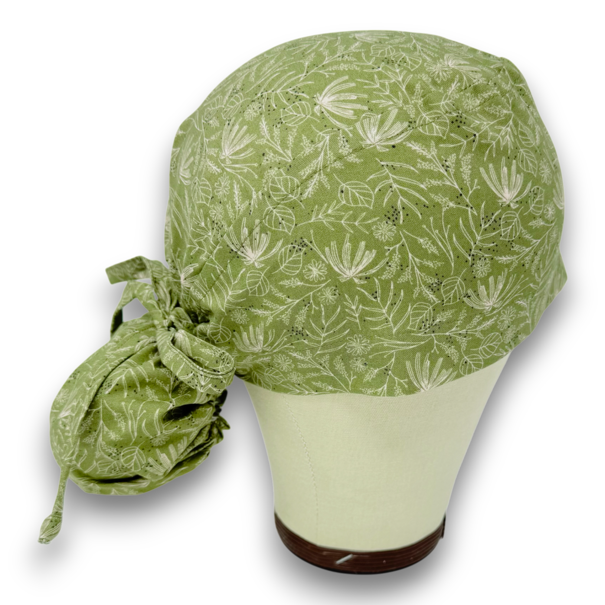 Green Floral Ponytail scrub cap for women with satin lined option by Paradise Caps.