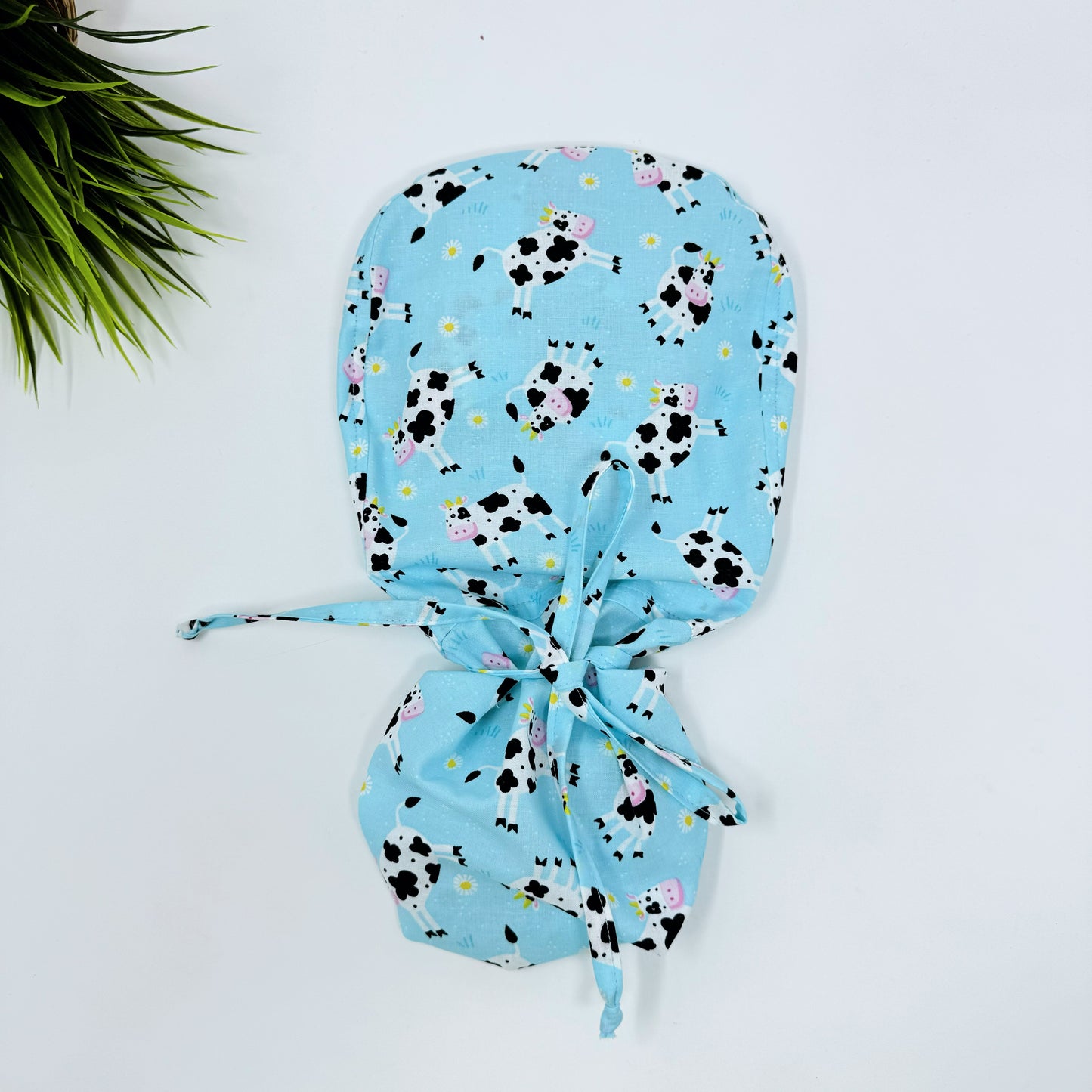 Cows on Blue Ponytail scrub cap, Surgical cap women. Satin Lined Option Surgical cap with ponytail.