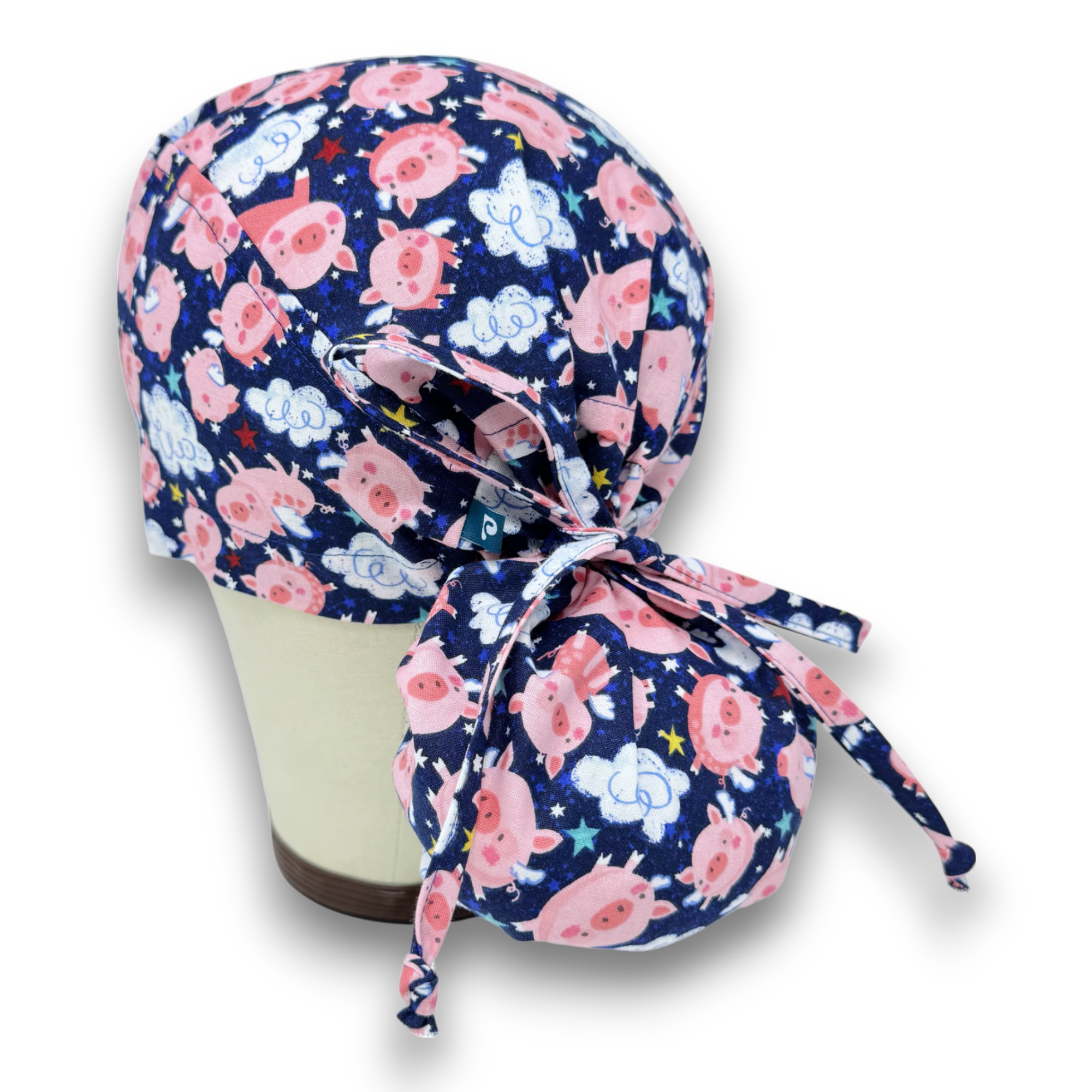 Pig Ponytail scrub cap for women with satin lined option by Paradise Caps.