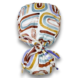 Rainbow Ponytail scrub cap for women with satin lined option by Paradise Caps.