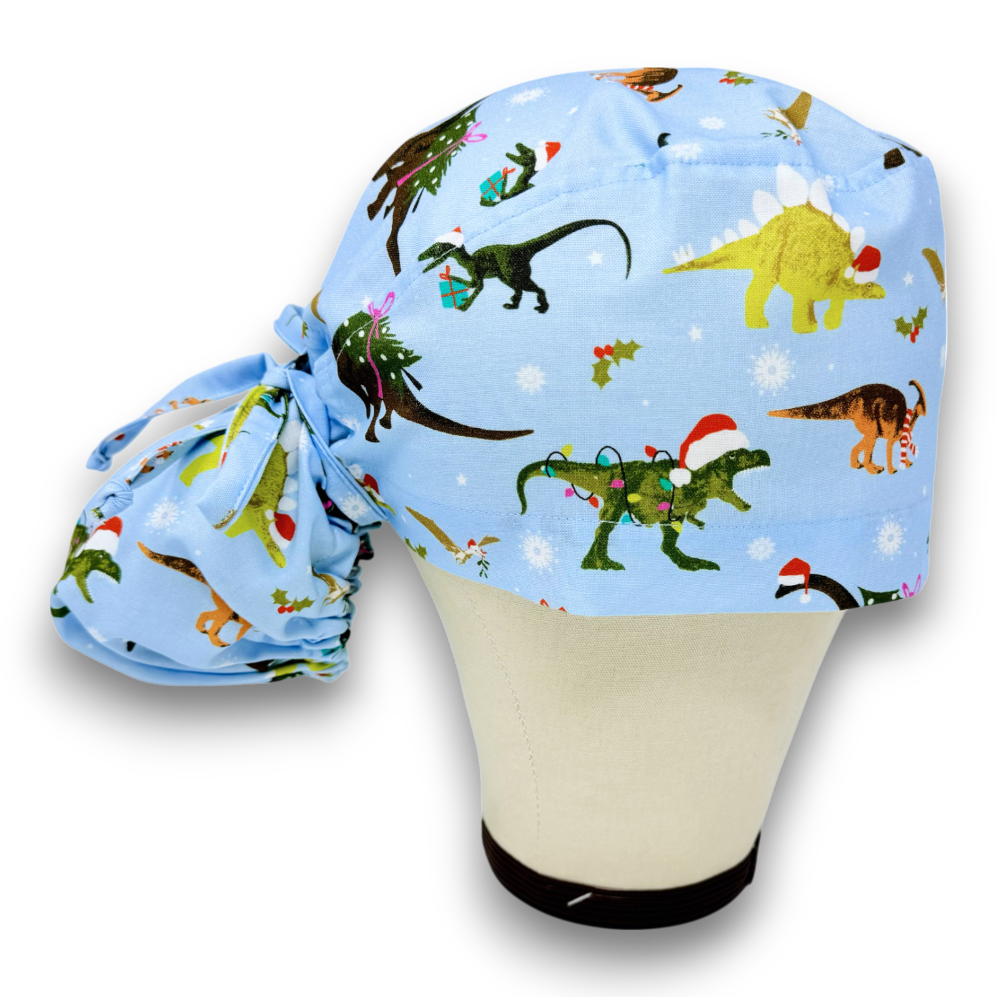 Christmas Dino Ponytail scrub cap for women with satin lined option by Paradise Caps.