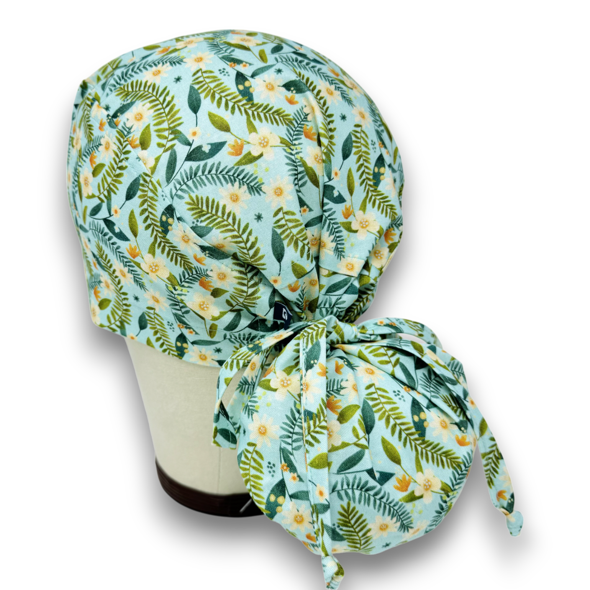 Yellow flower Ponytail scrub cap for women with satin lined option by Paradise Caps.