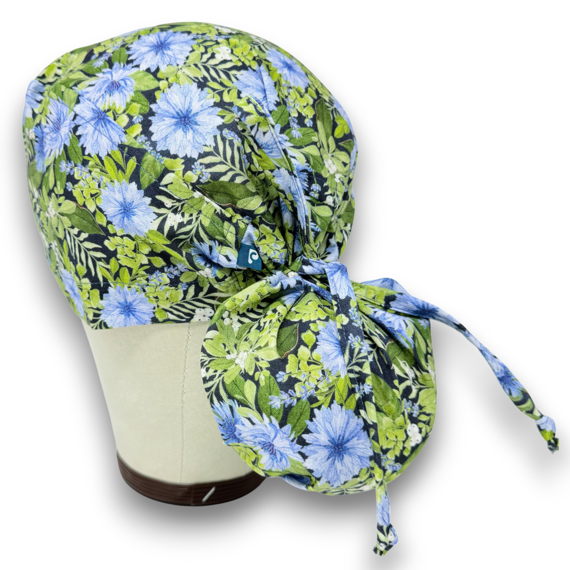 Cornflower Ponytail scrub cap for women with satin lined option by Paradise Caps.