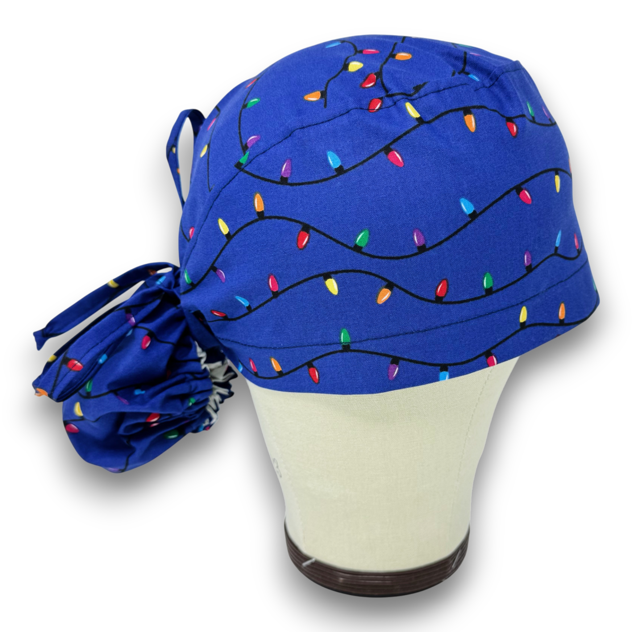 Christmas Lights Ponytail scrub cap for women with satin lined option by Paradise Caps.