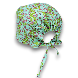 Pink flower skull tie-back style surgical scrub cap by Paradise Caps.