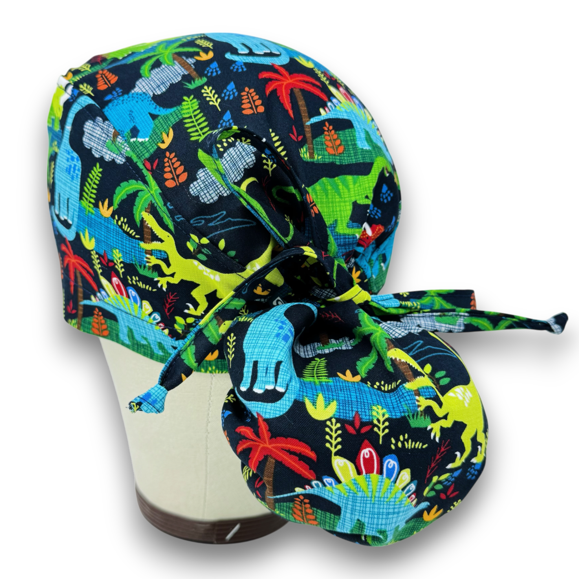 Dinosaur Ponytail scrub cap for women with satin lined option by Paradise Caps.