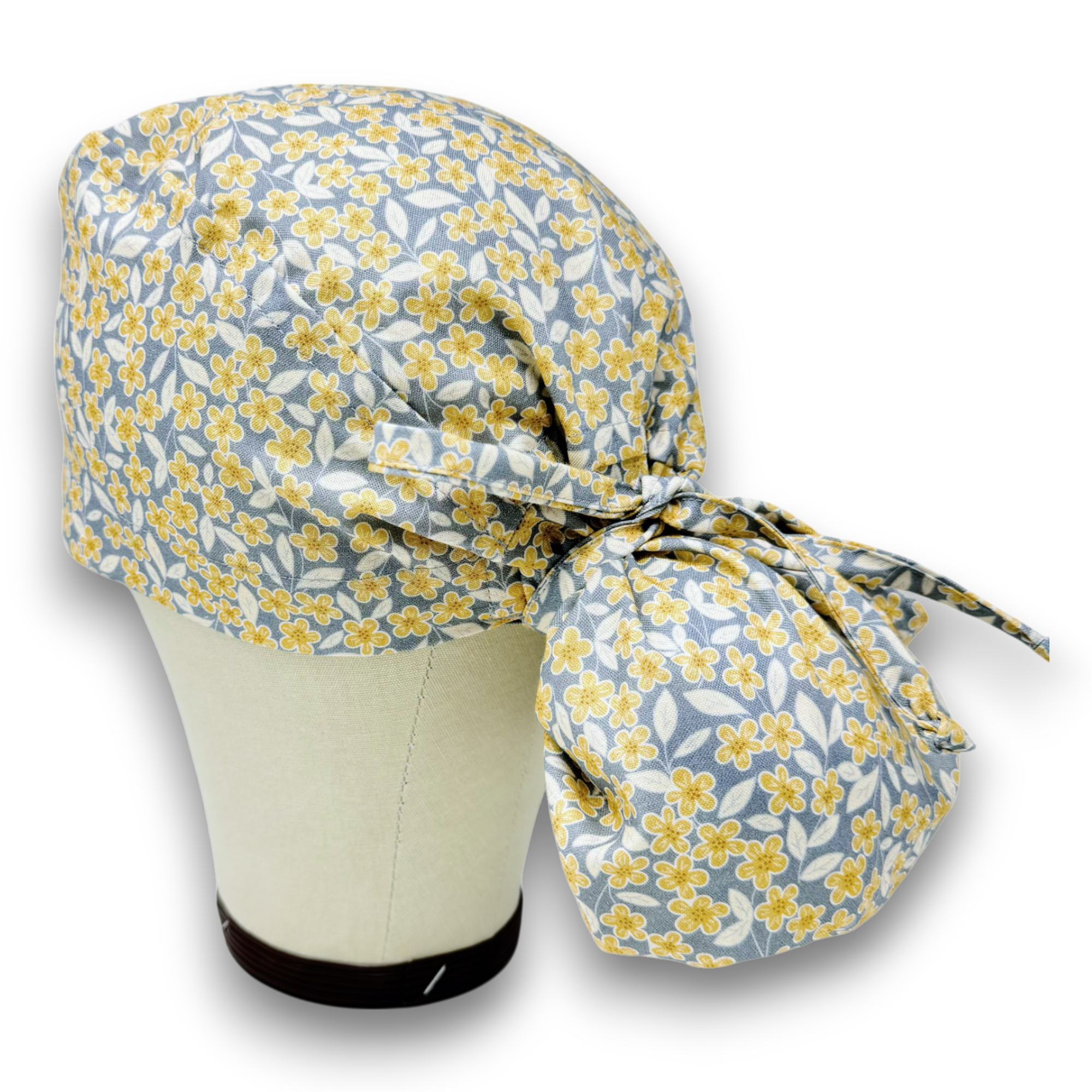 Floral Ponytail scrub cap for women with satin lined option by Paradise Caps.
