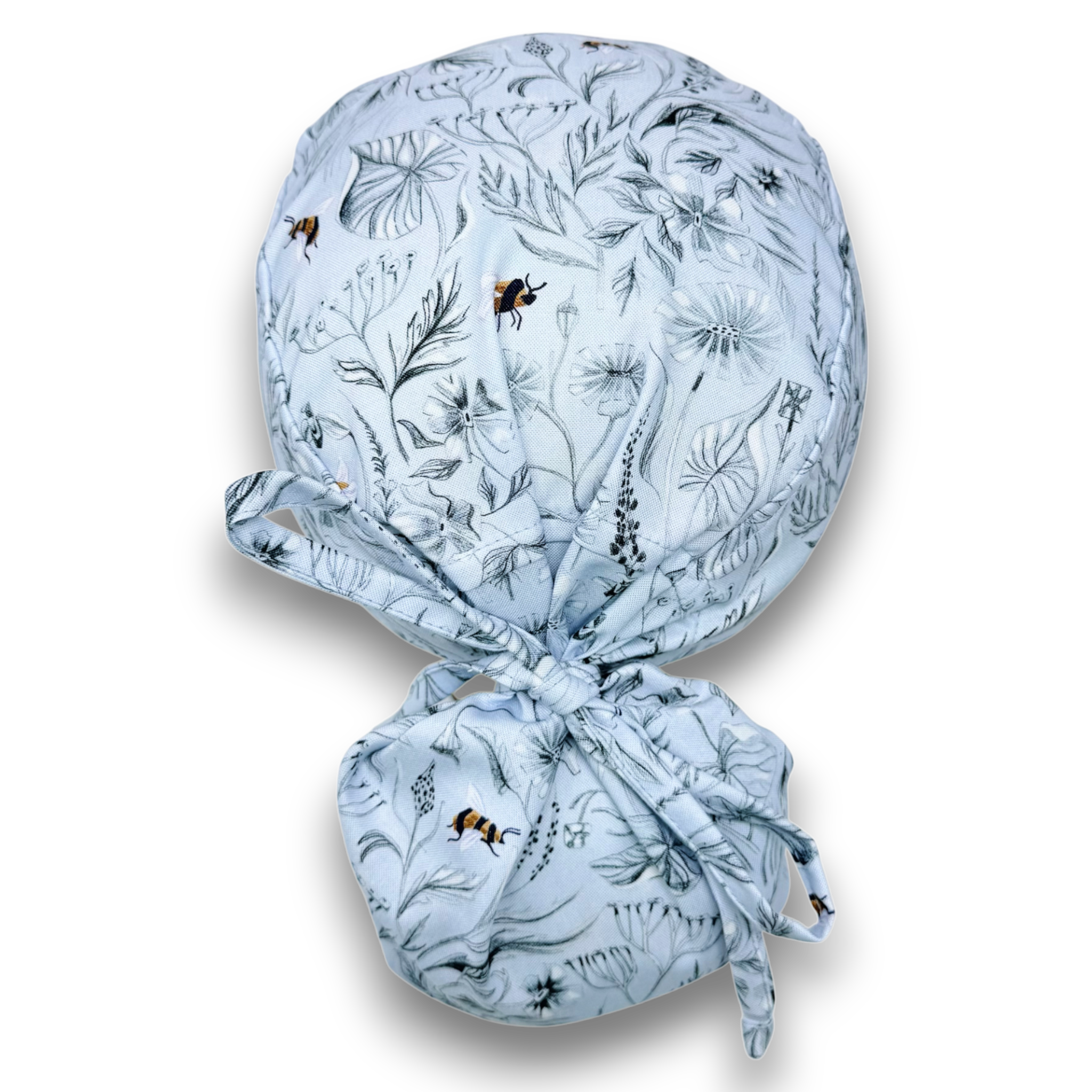 Glacier Pollinators Ponytail scrub cap for women with satin lined option by Paradise Caps.